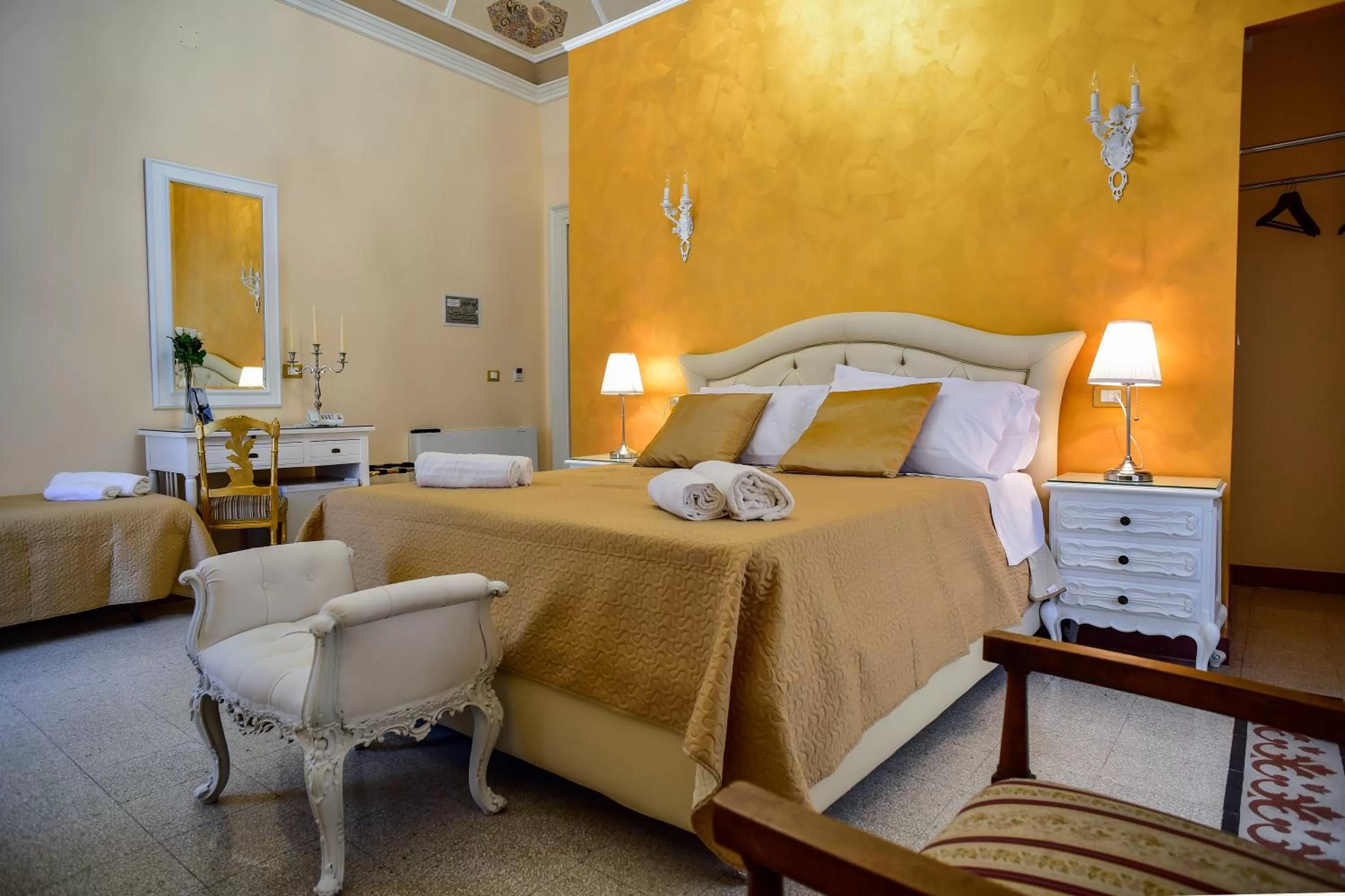 Photo of the whole room, Bed in Palazzo degli Affreschi