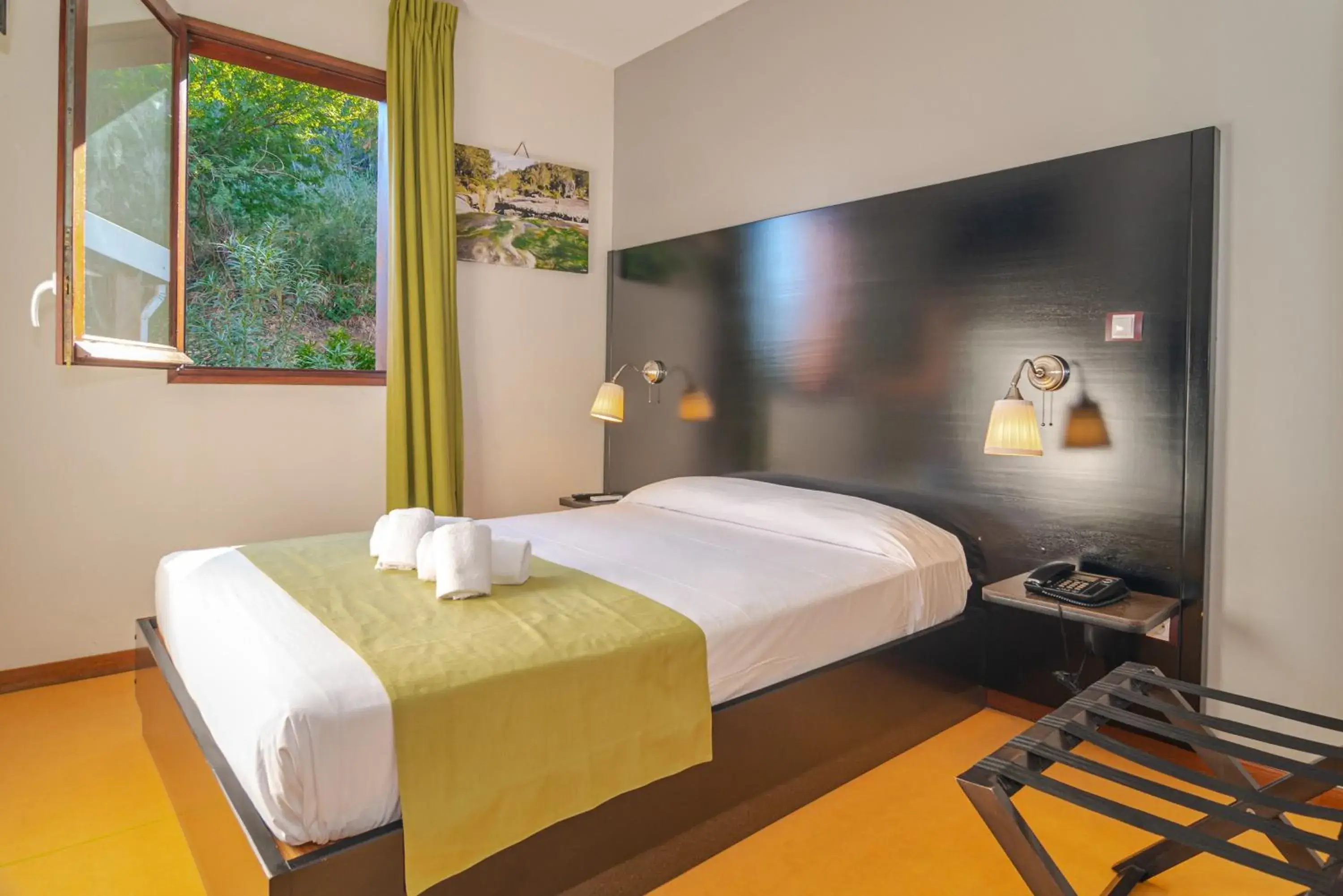 Photo of the whole room, Bed in Tama Hotel Photo of the whole room, Bed in Tama Hotel