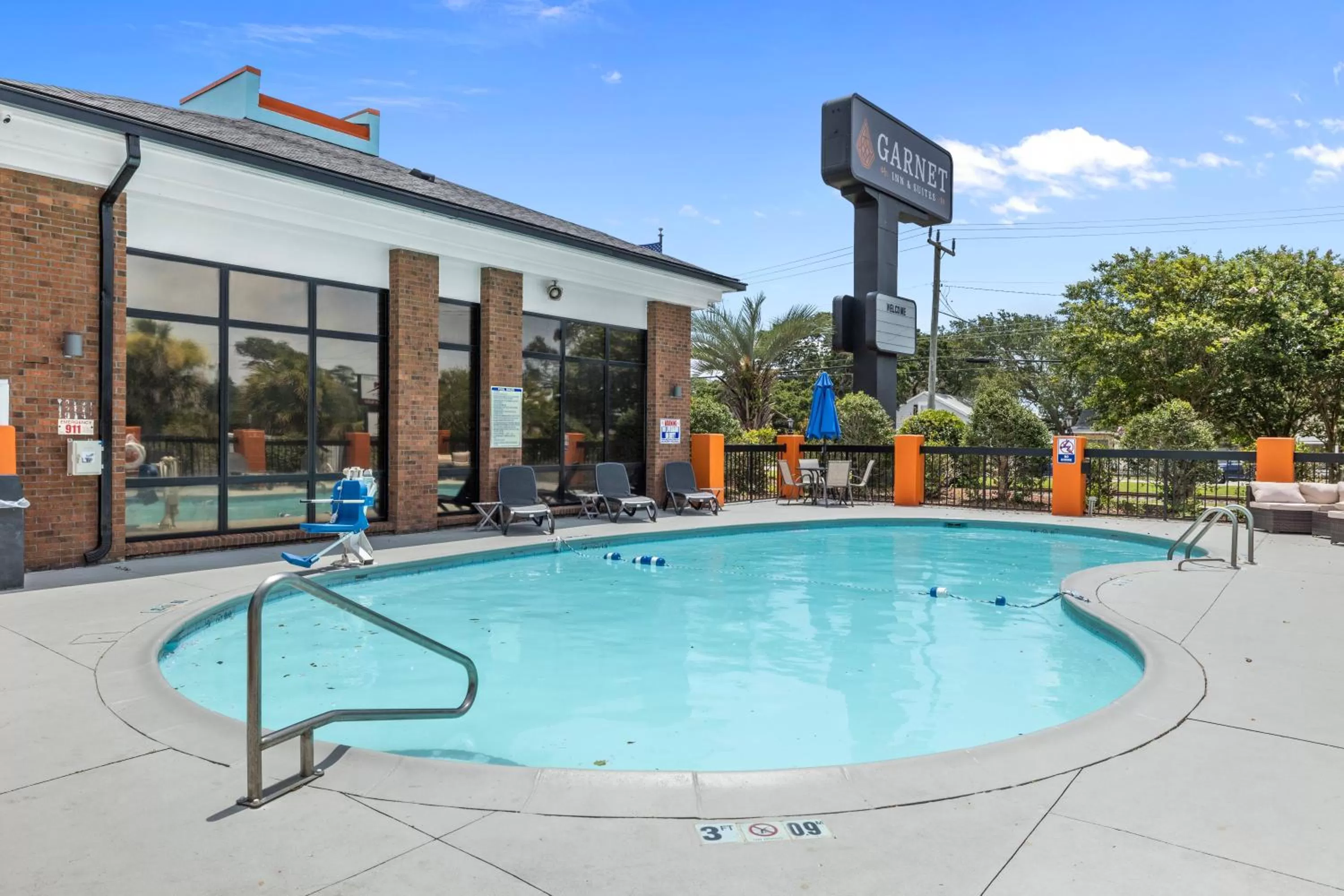 Swimming pool in Garnet Inn & Suites, Morehead City near Atlantic Beach