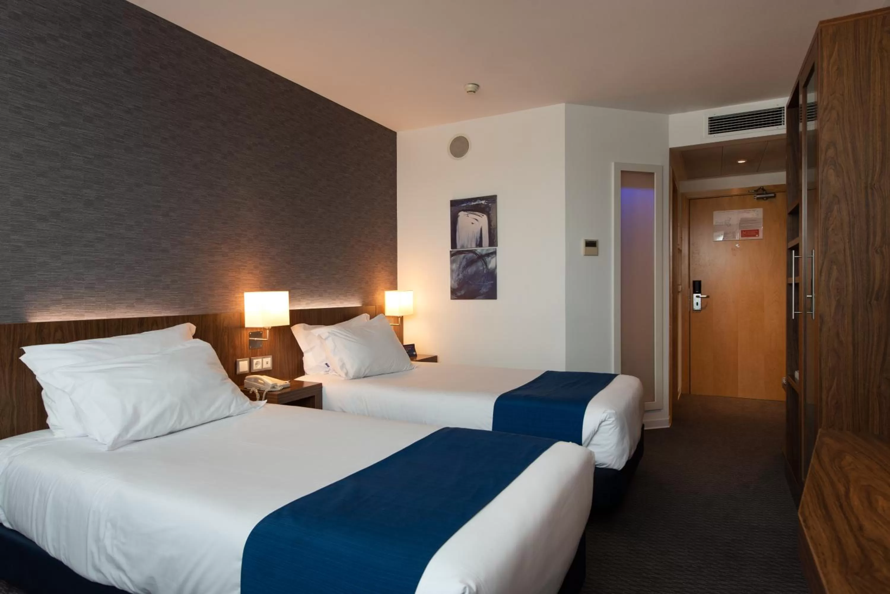 Photo of the whole room, Bed in Holiday Inn Express Lisbon Airport by IHG