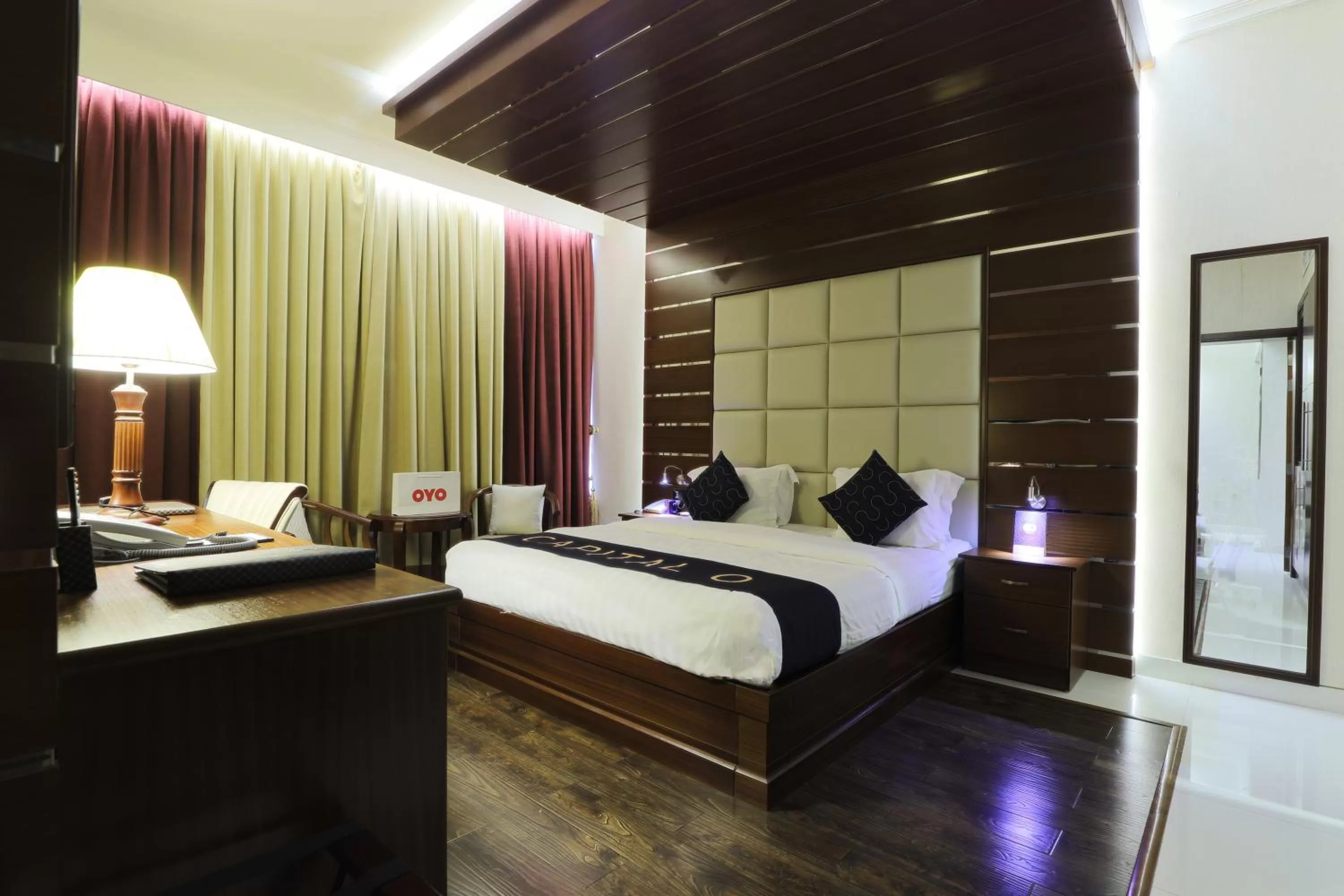 Bed in Queen Palace Hotel