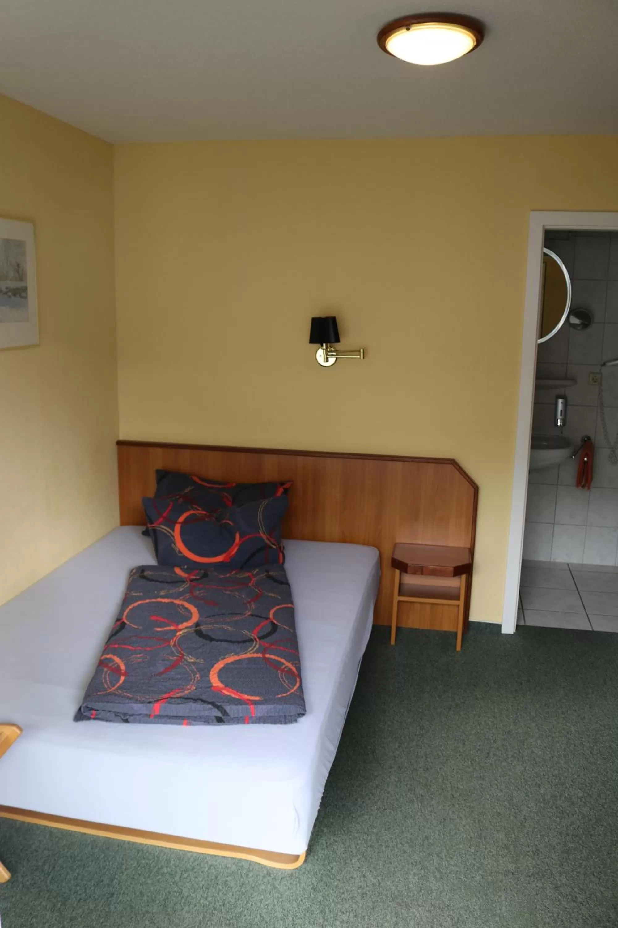 Bed in Stadthotel Brandenburger Hof