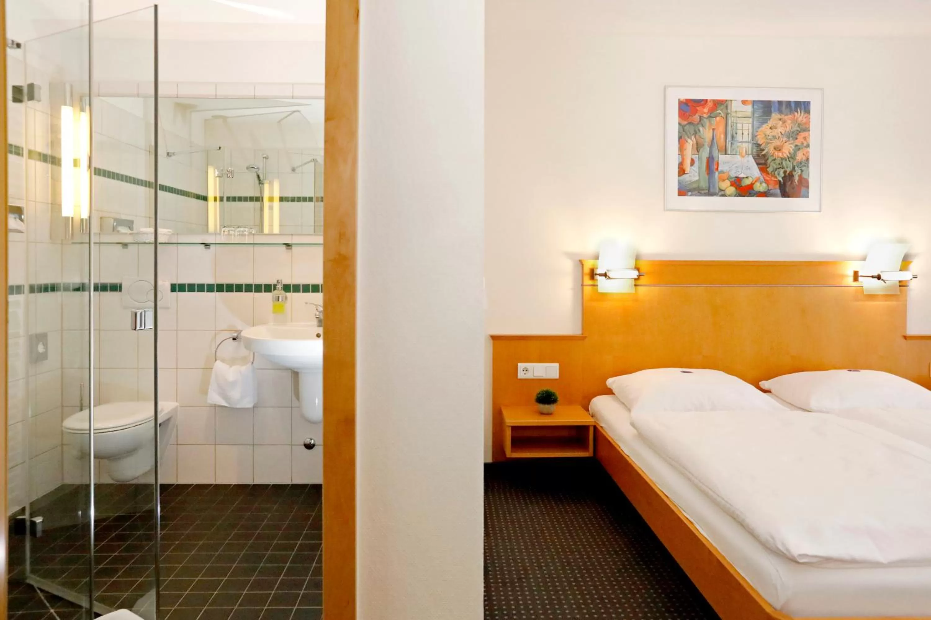 Photo of the whole room, Bed in Landhotel Altes Wasserwerk GbR