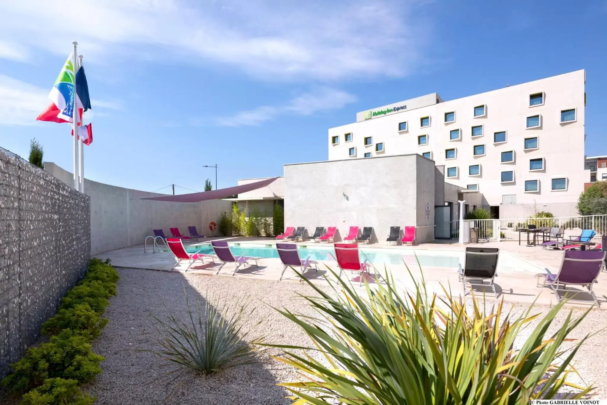 Property building, Swimming Pool in Holiday Inn Express Montpellier - Odysseum, an IHG Hotel