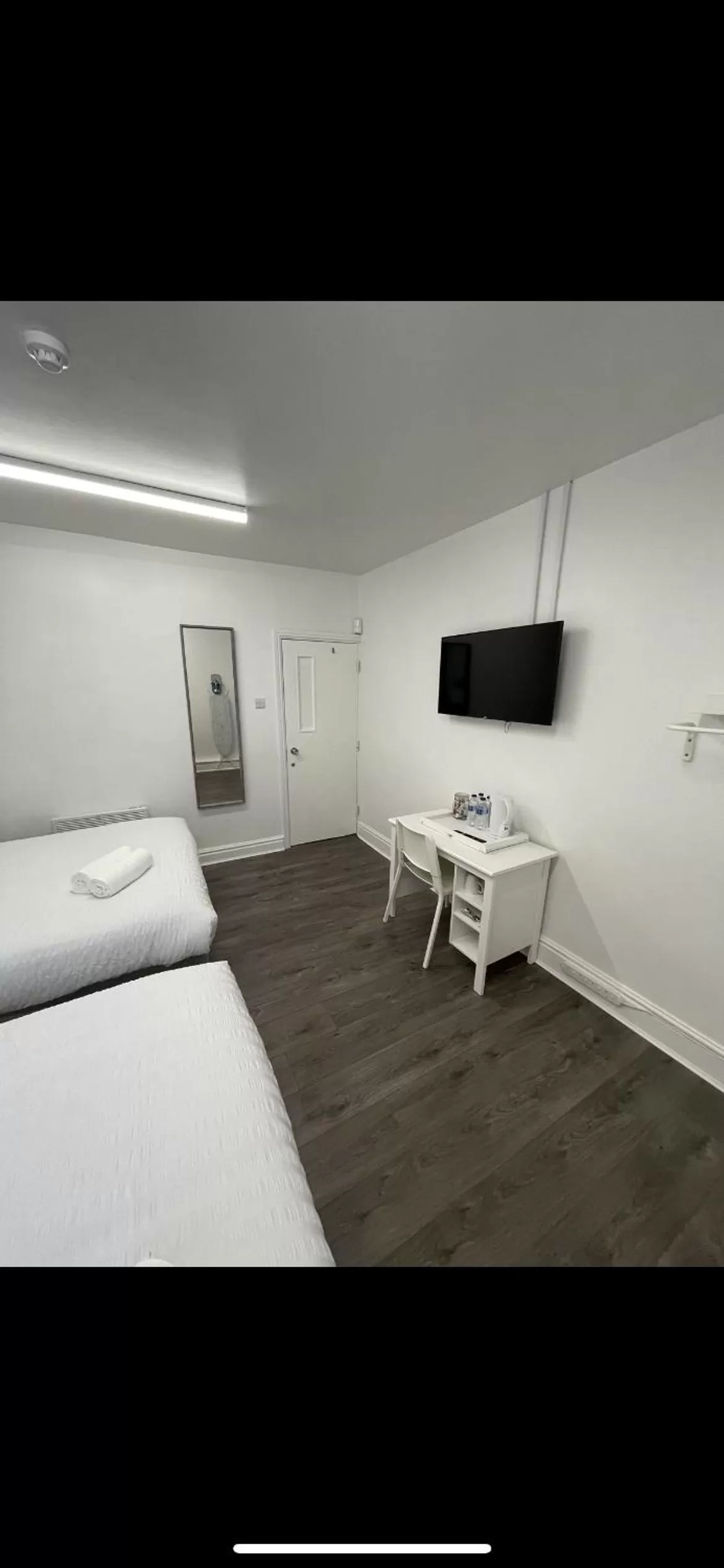 TV/Entertainment Center in County road rooms