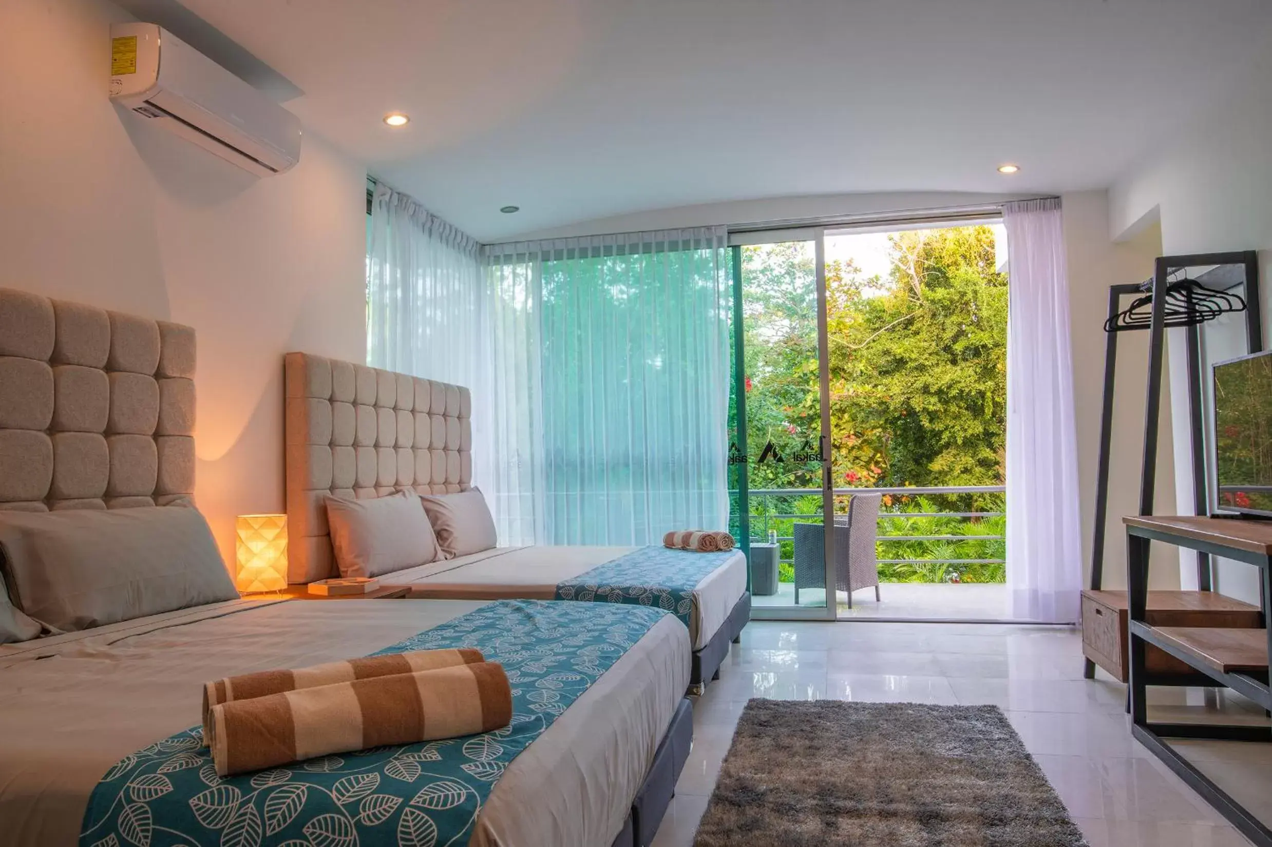 Family Room with Balcony in Casa Aakal Lagoon Front