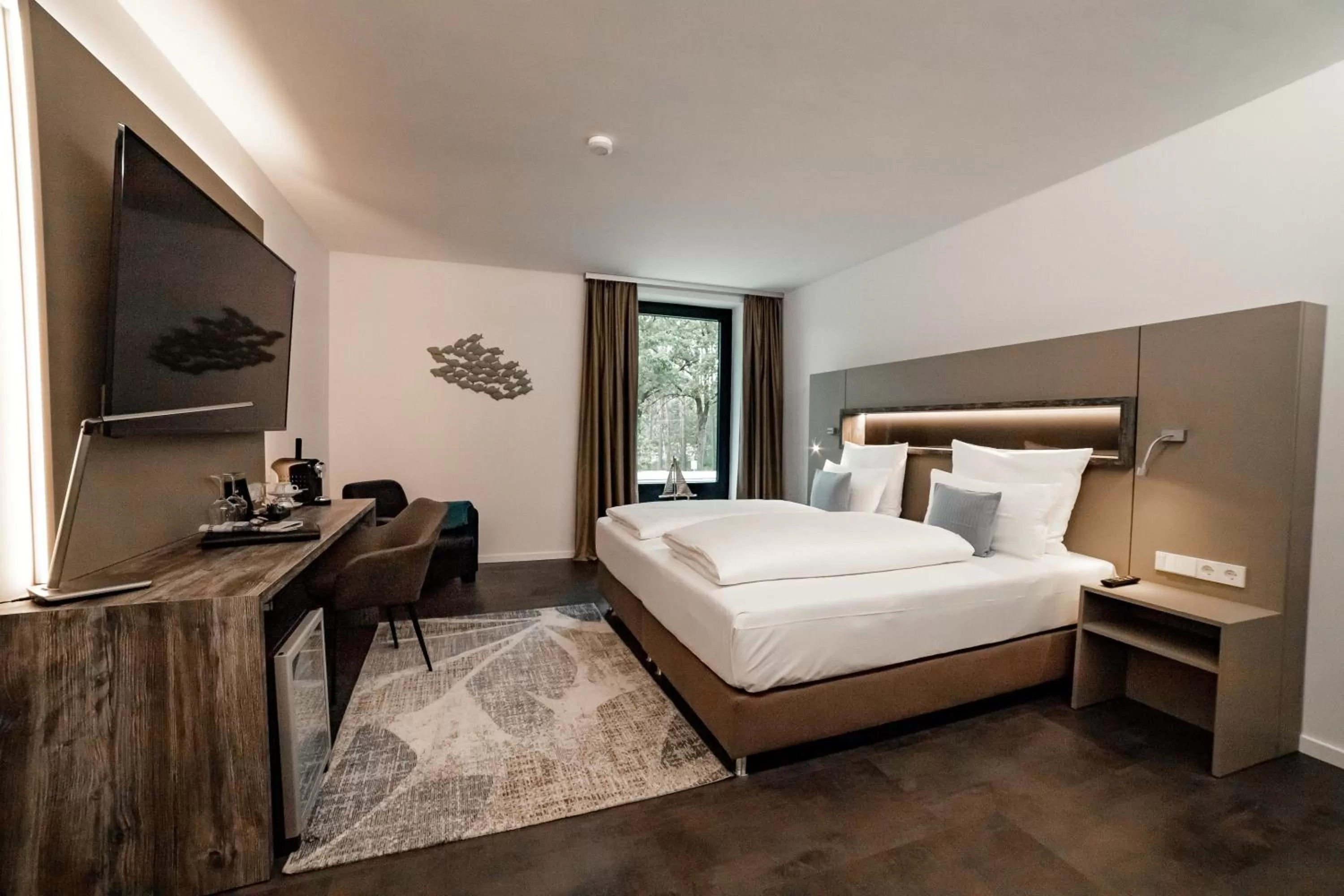 Photo of the whole room, Bed in Seehotel am Tankumsee