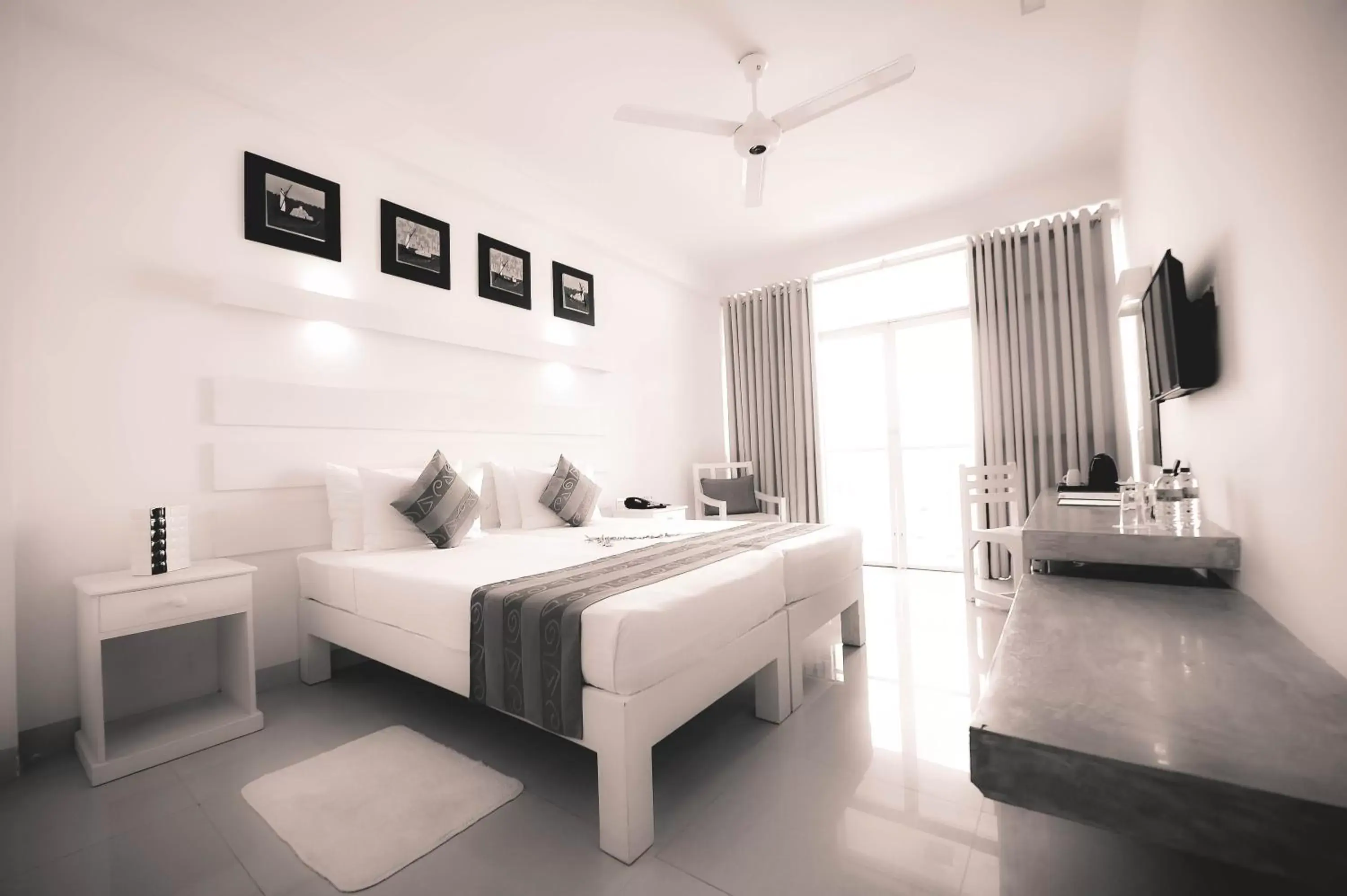 Photo of the whole room, Bed in Beacon Beach Hotel Negombo