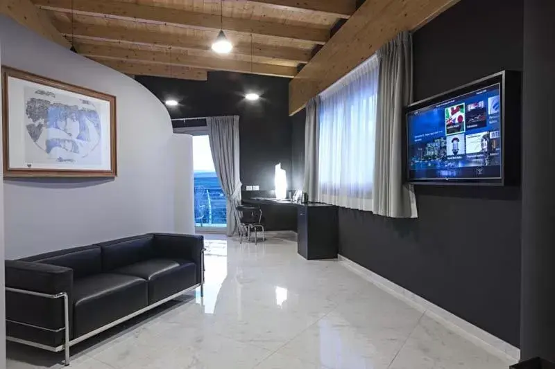 Living room, TV/Entertainment Center in San Barbato Resort Spa & Golf
