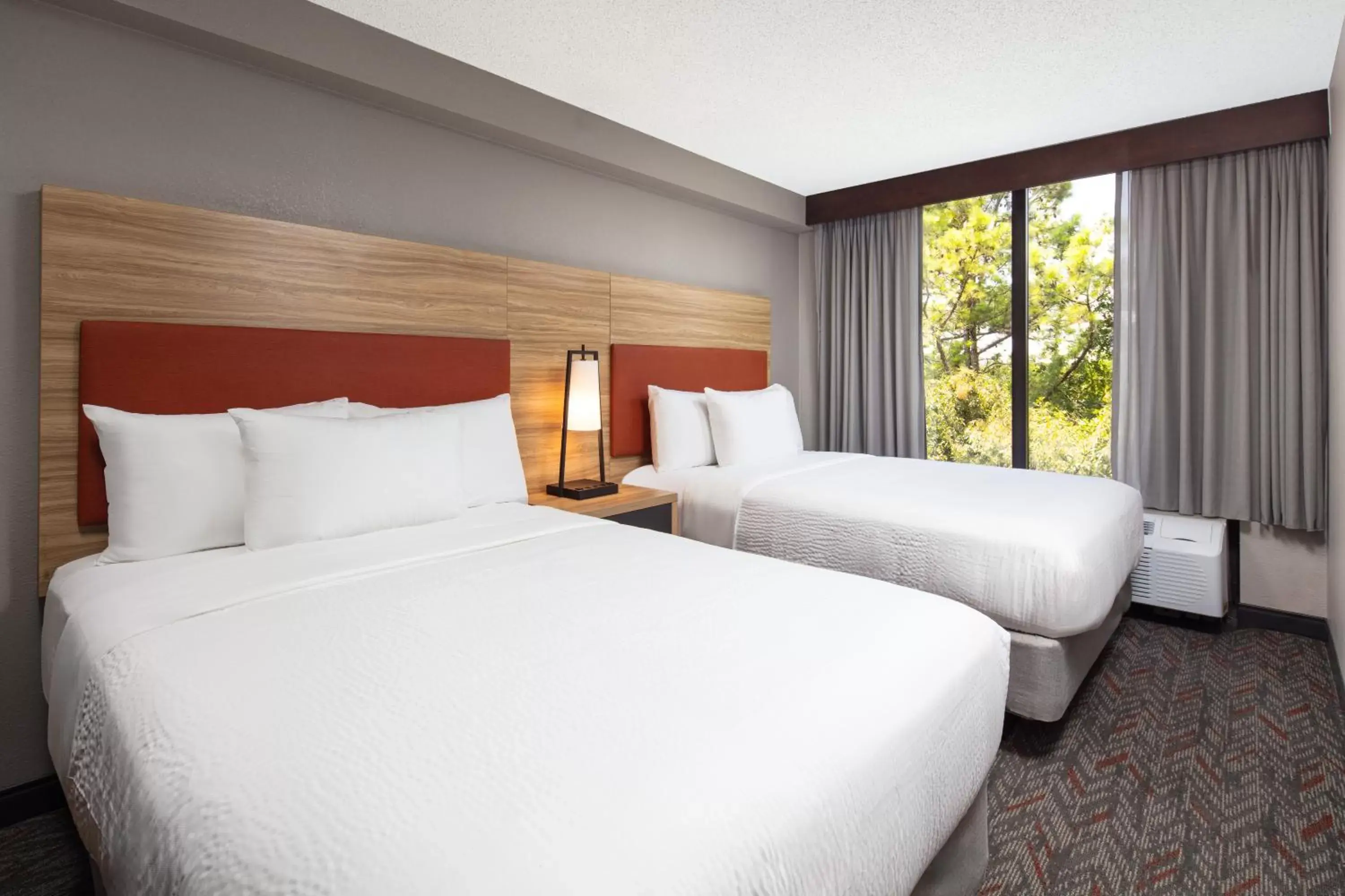 Bed in Candlewood Suites - Cincinnati Northeast - Mason, an IHG Hotel