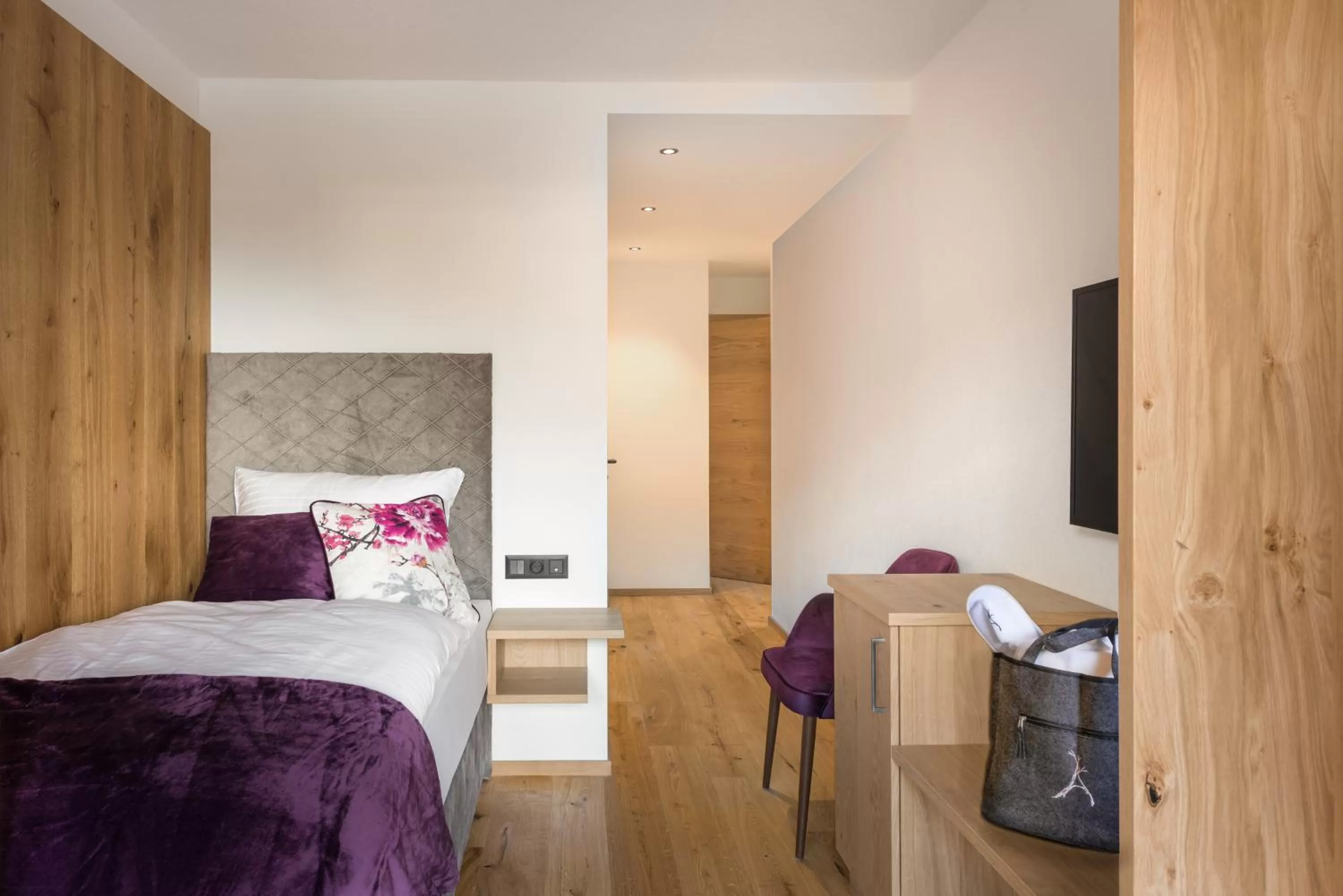 Bed in Boutiquehotel die Alpbacherin 4 Sterne Superior