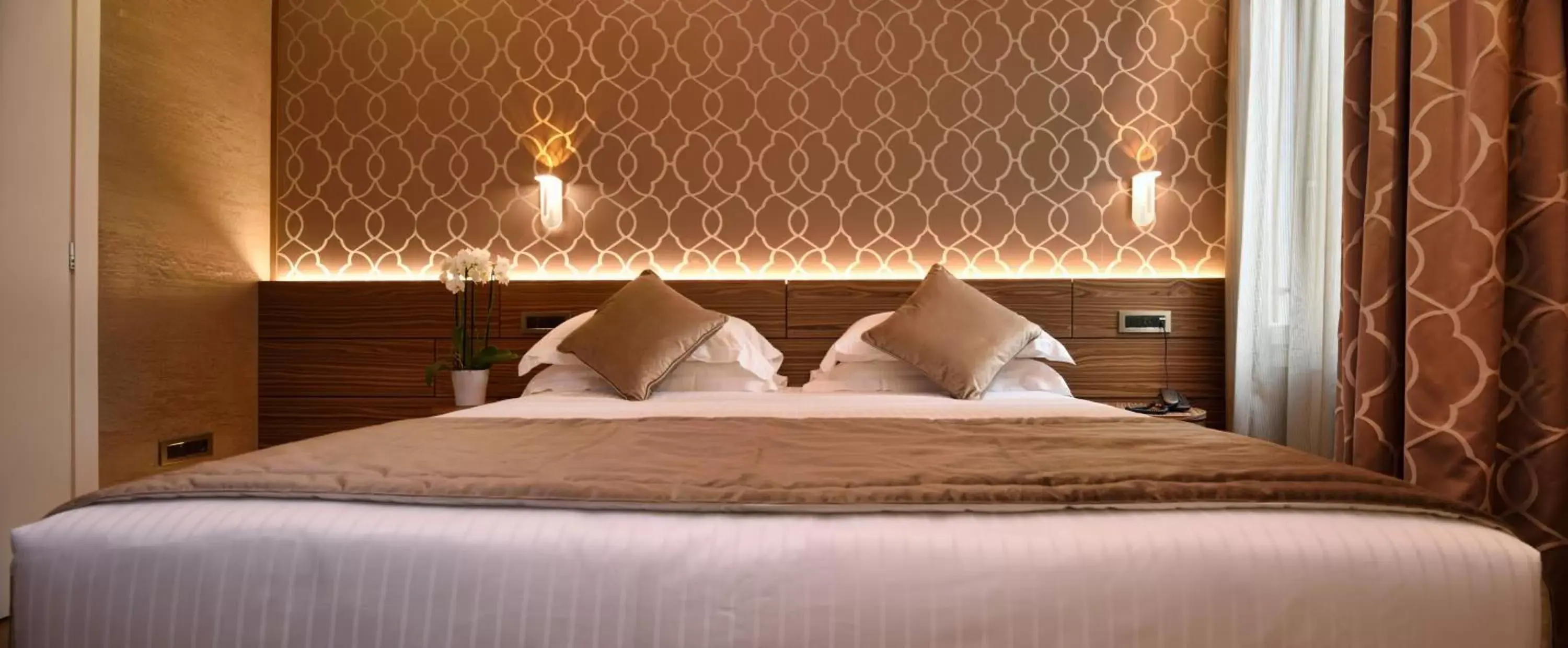 Decorative detail, Bed in Rosa Salva Hotel