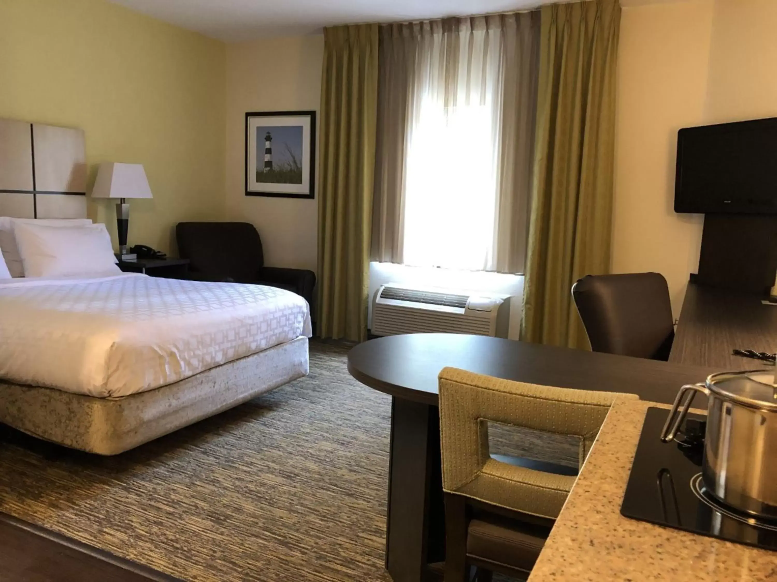 Photo of the whole room, Bed in Candlewood Suites Greenville NC, an IHG Hotel