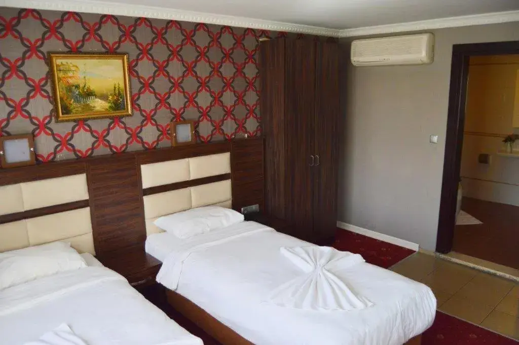 Bed in Comfort Life Hotel