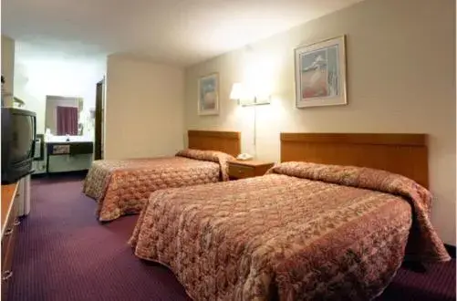 Bed in Americas Best Value Inn Cartersville