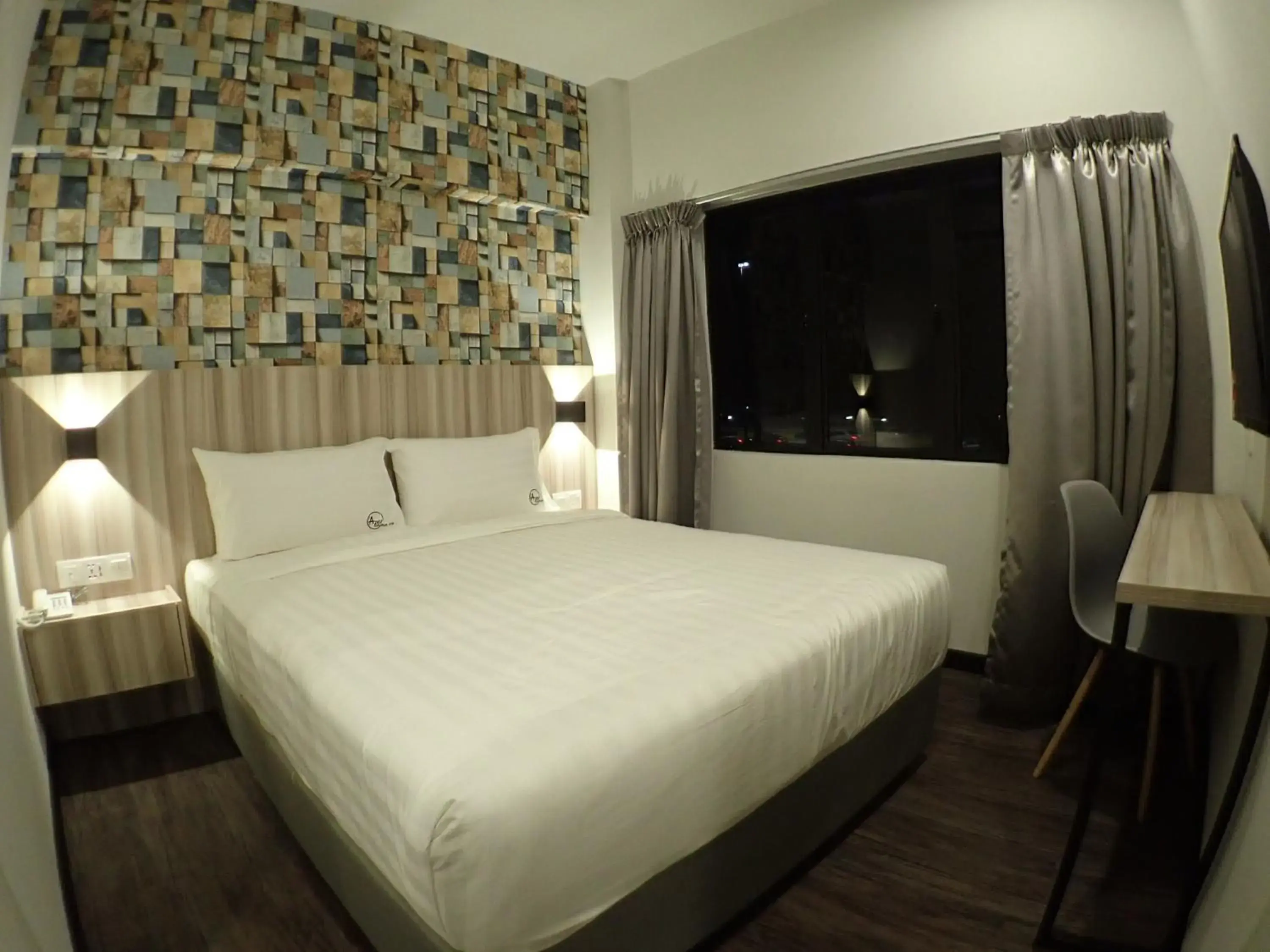 Photo of the whole room, Bed in Apex Boutique Hotel @ Bandar Sunway