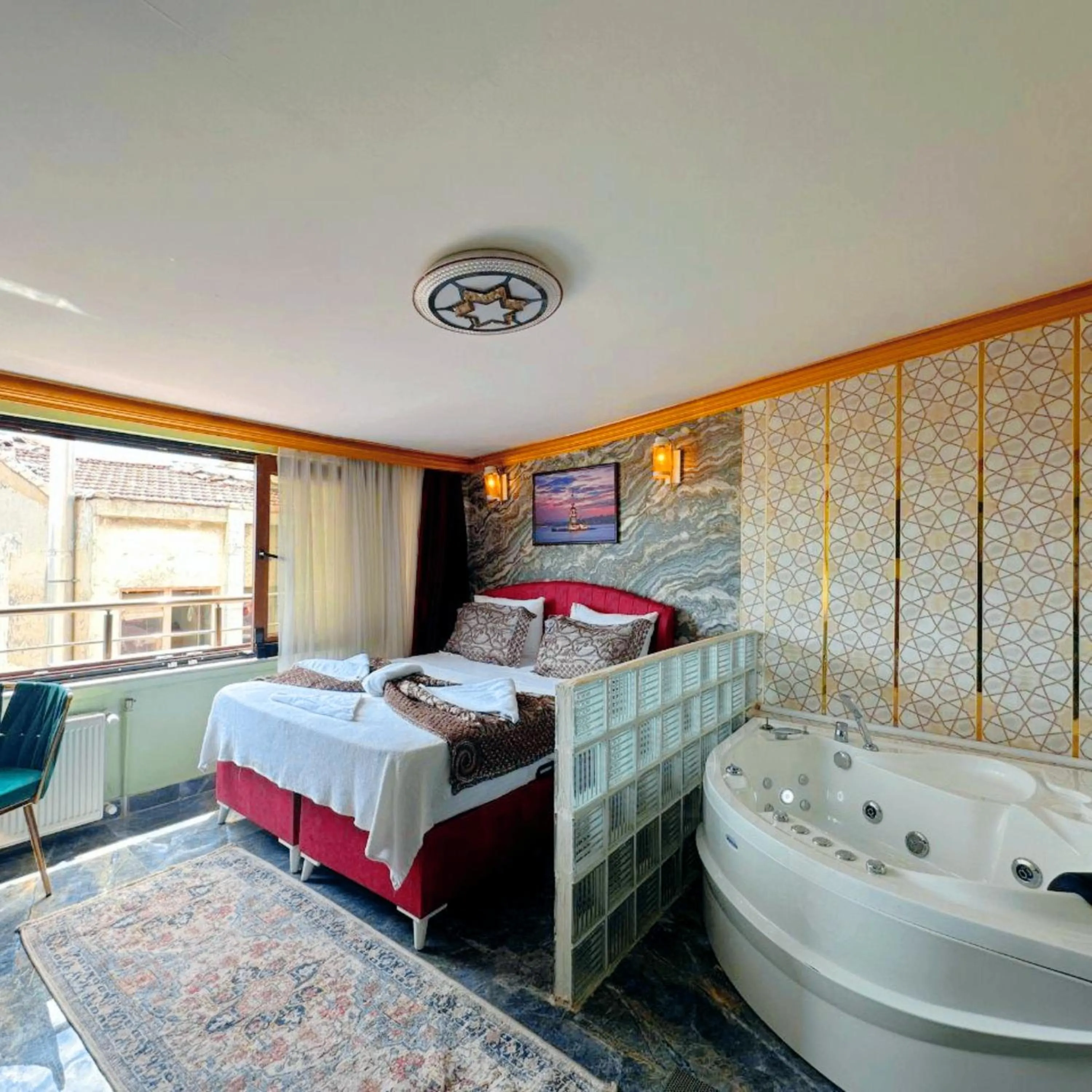 Bed in Royal Gur Hotel