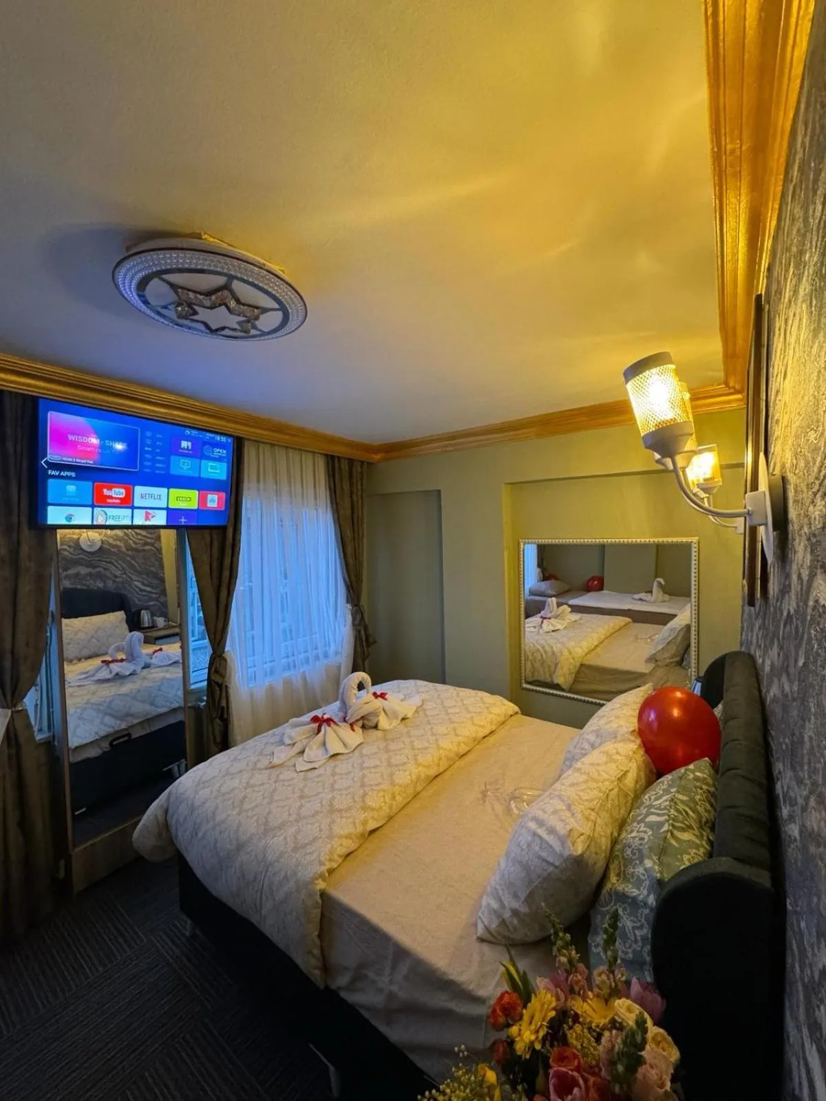 Bed in Royal Gur Hotel