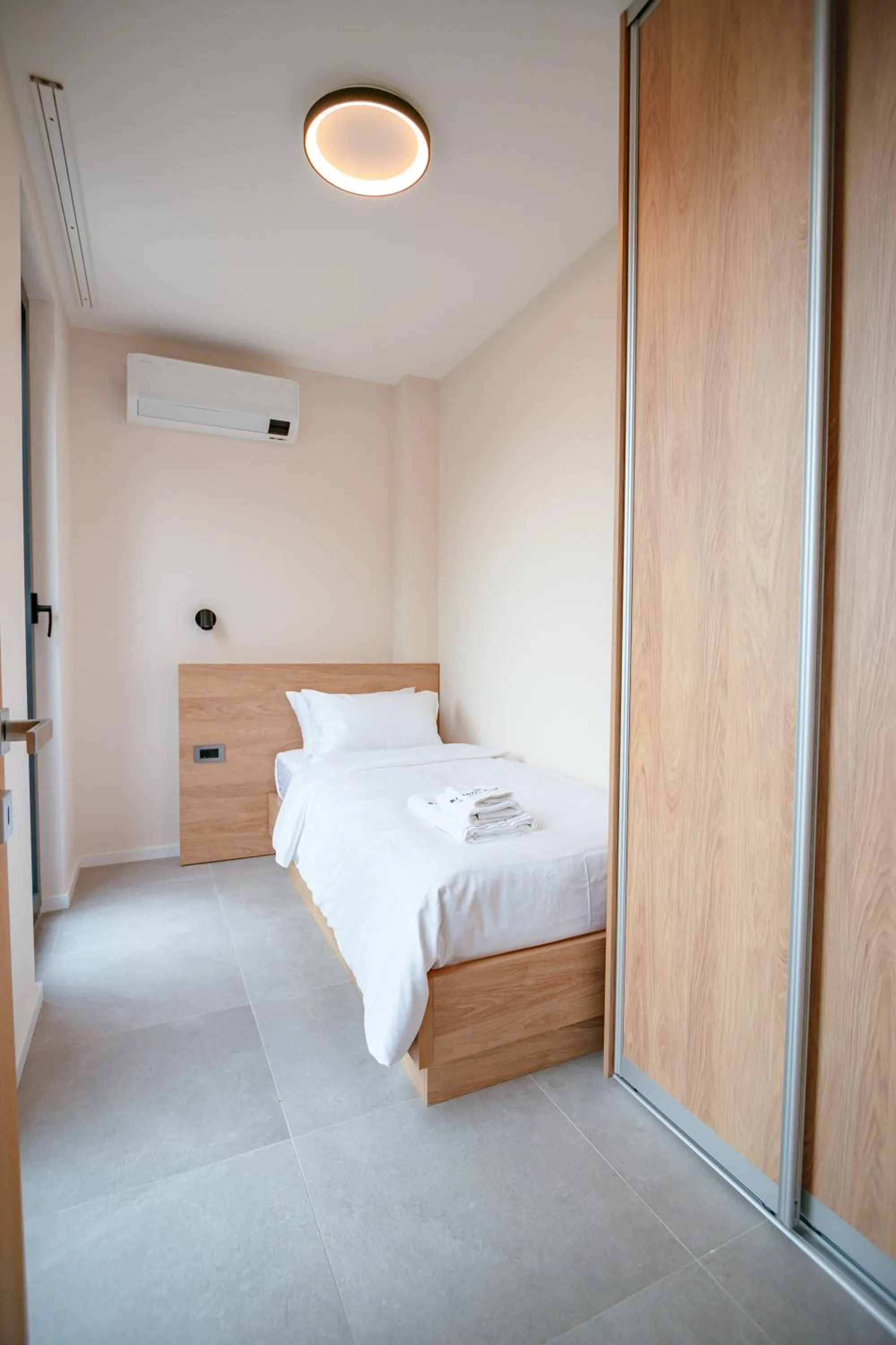 Bed in Royal Blue Resort & Residences