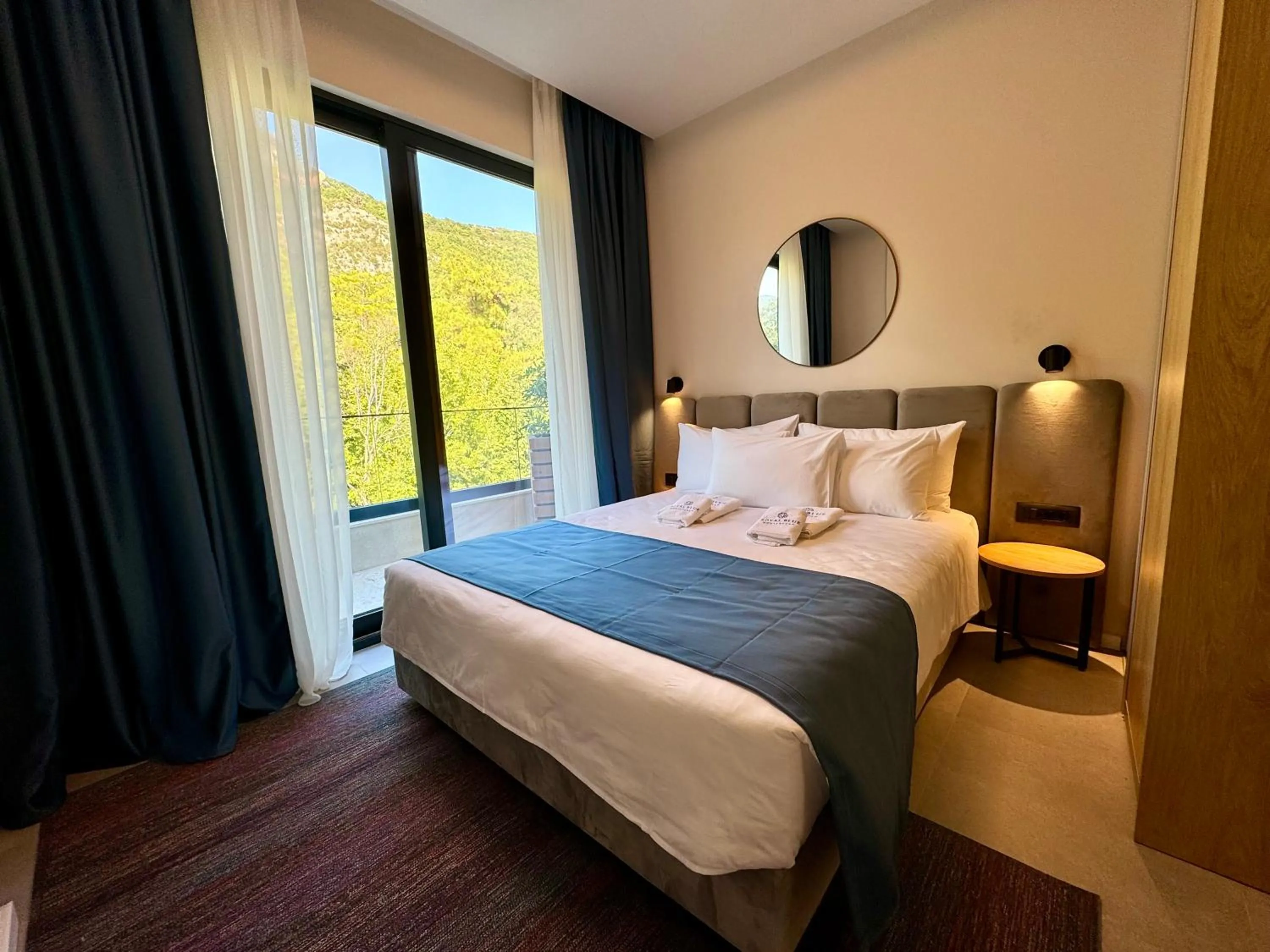 Bed in Royal Blue Resort & Residences