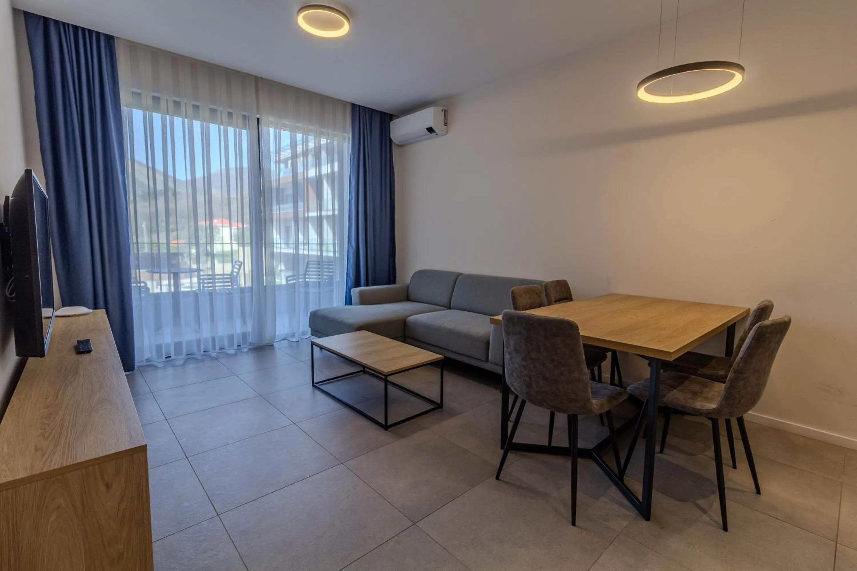 TV and multimedia in Royal Blue Resort & Residences