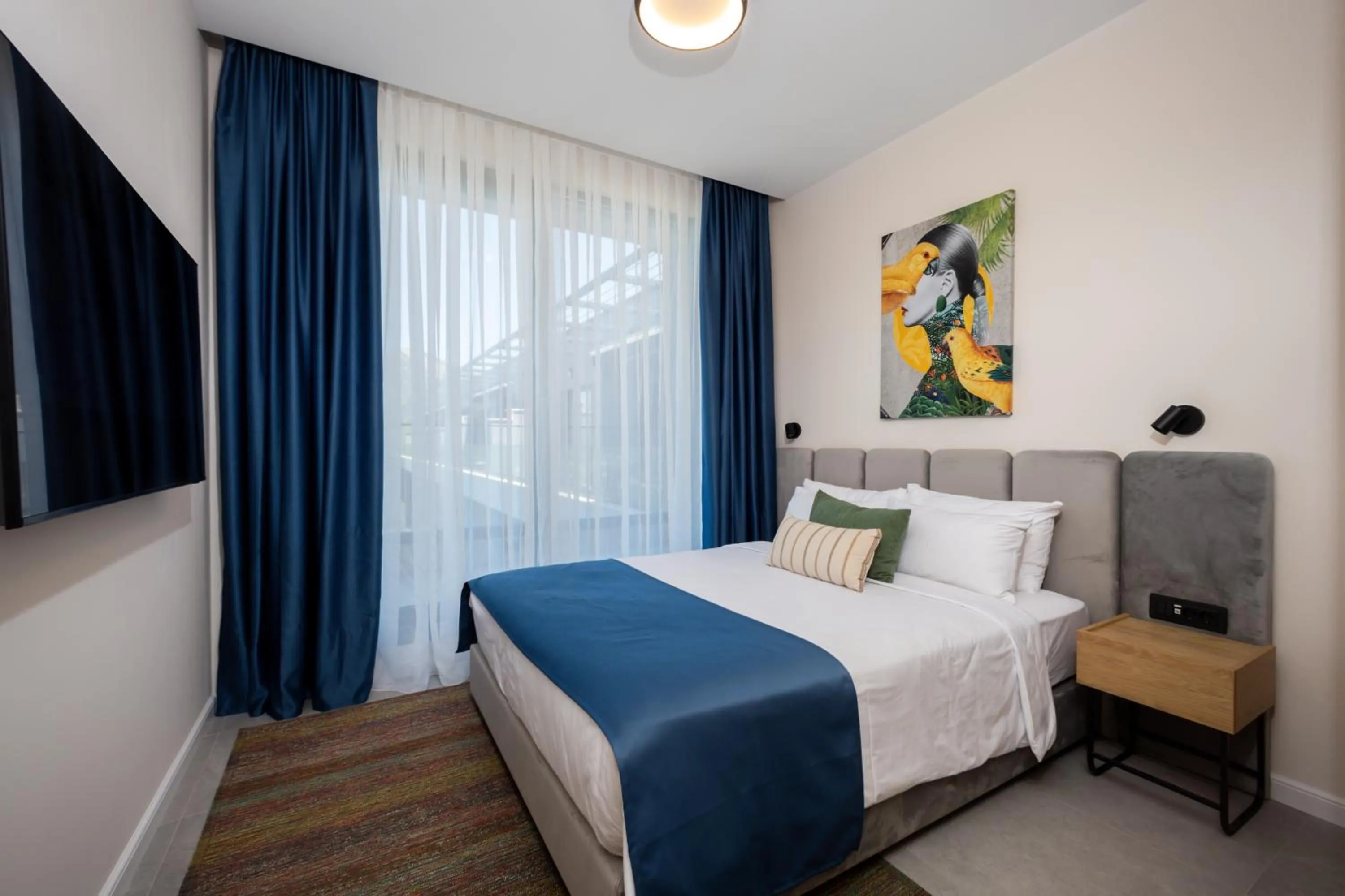 Bed in Royal Blue Resort & Residences