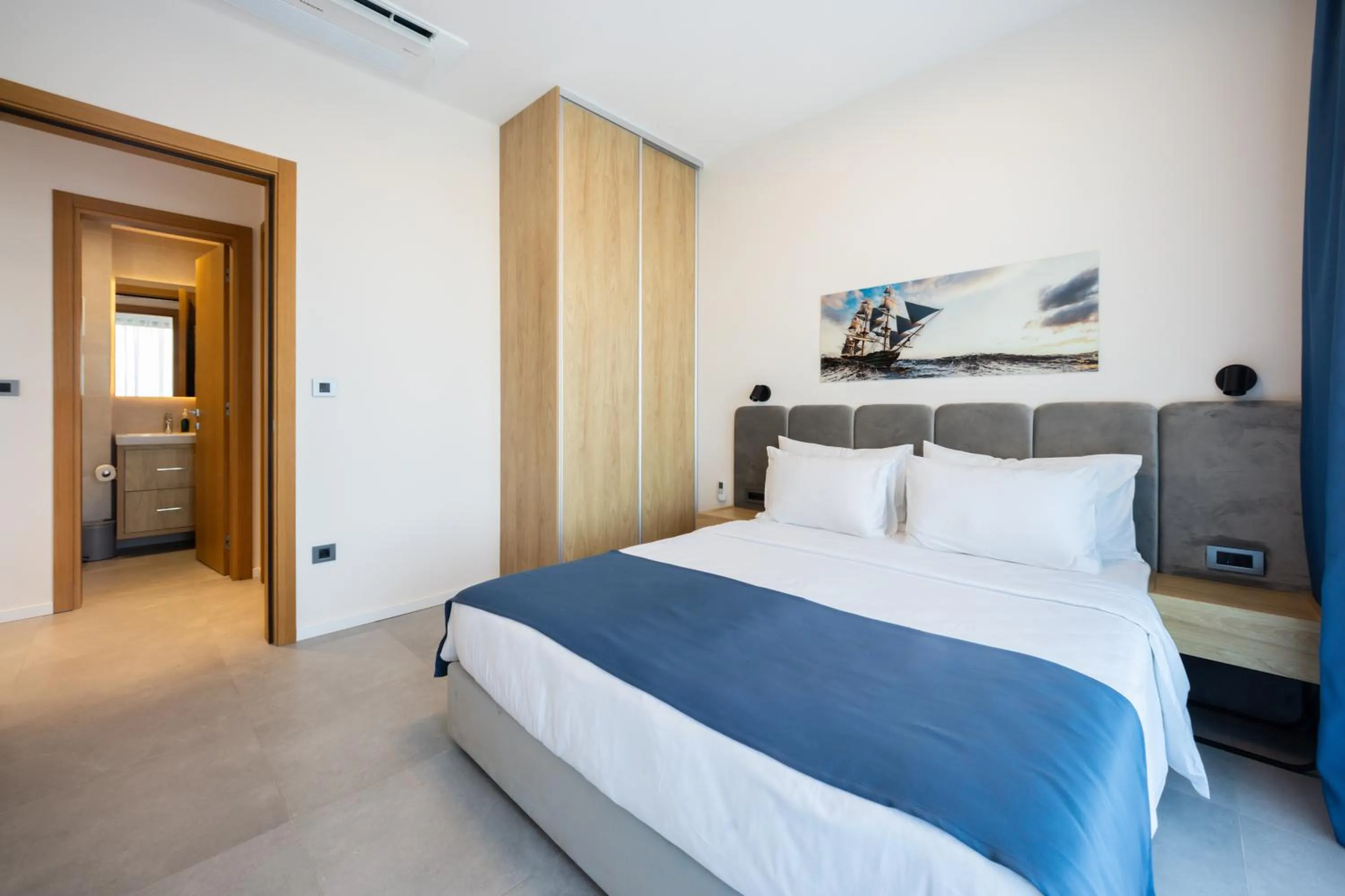 Bed in Royal Blue Resort & Residences