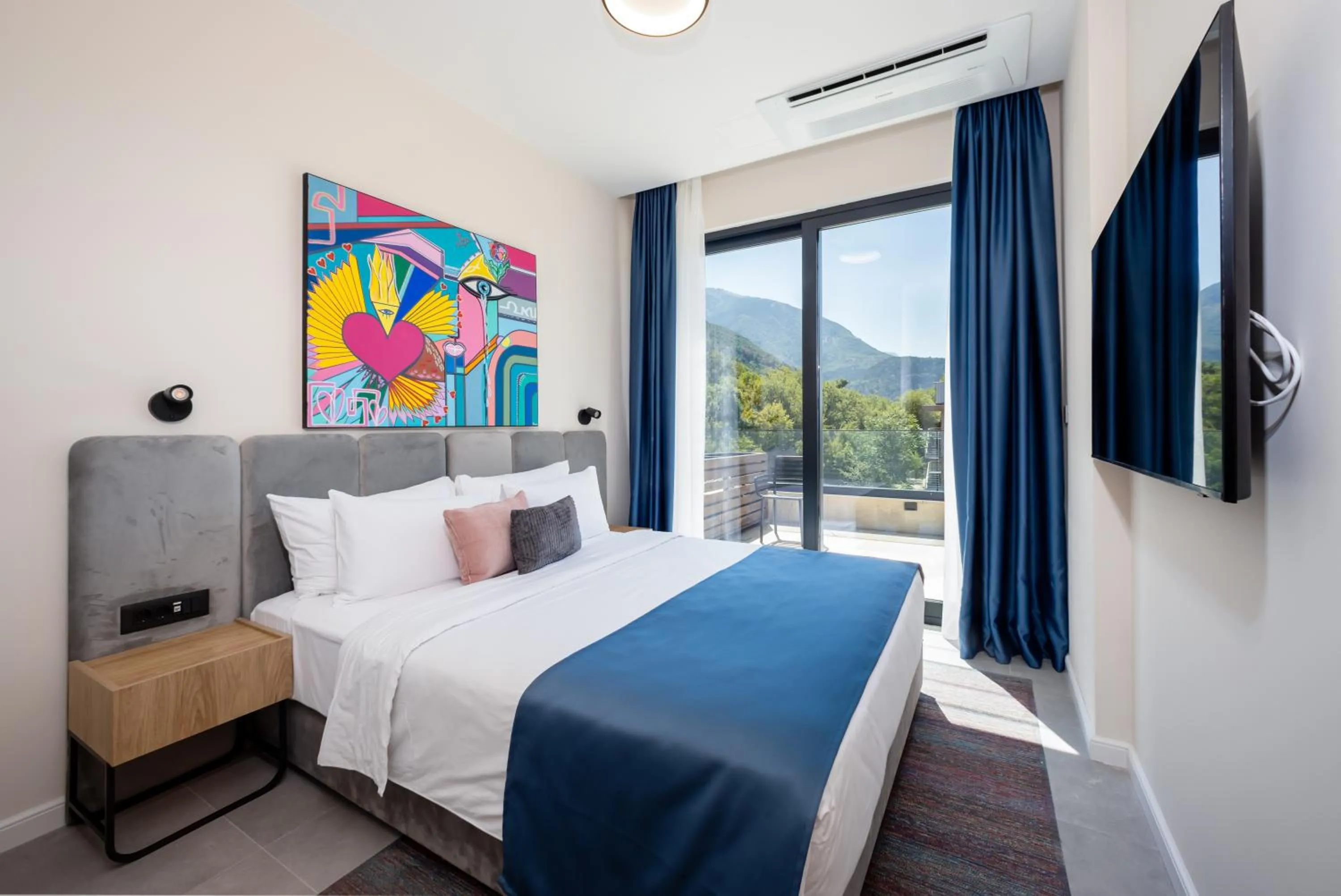 Bed in Royal Blue Resort & Residences