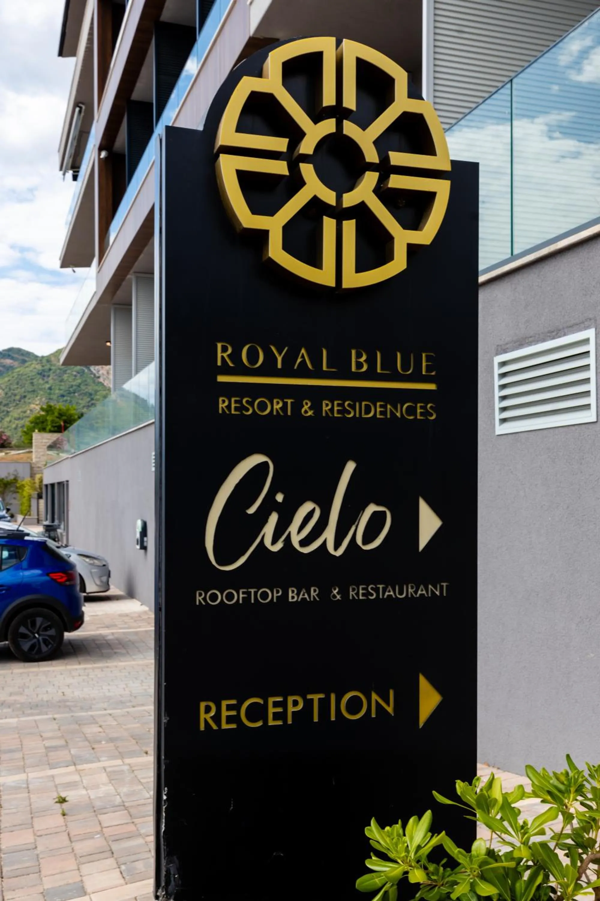 Property logo or sign in Royal Blue Resort & Residences