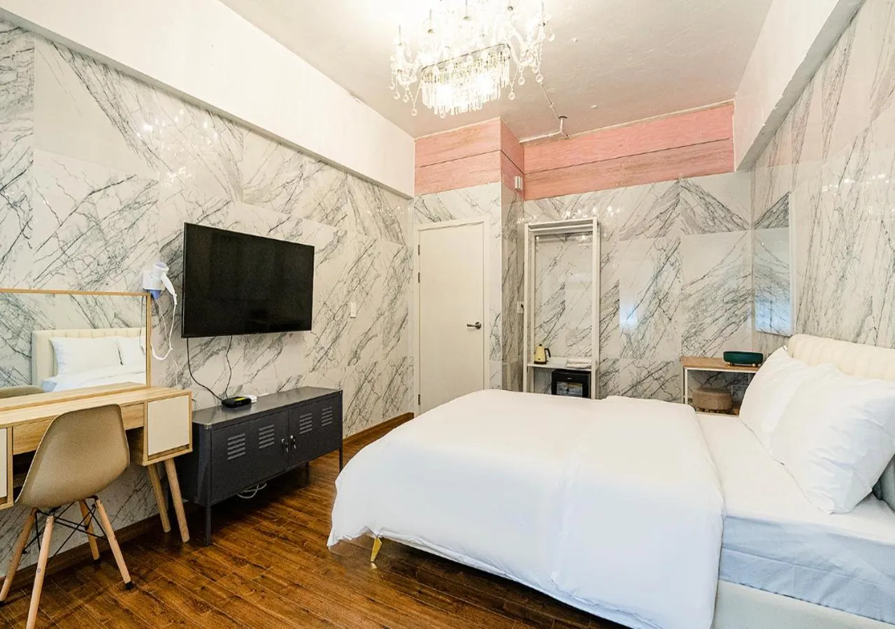 Bed in Woomigwan Hotel