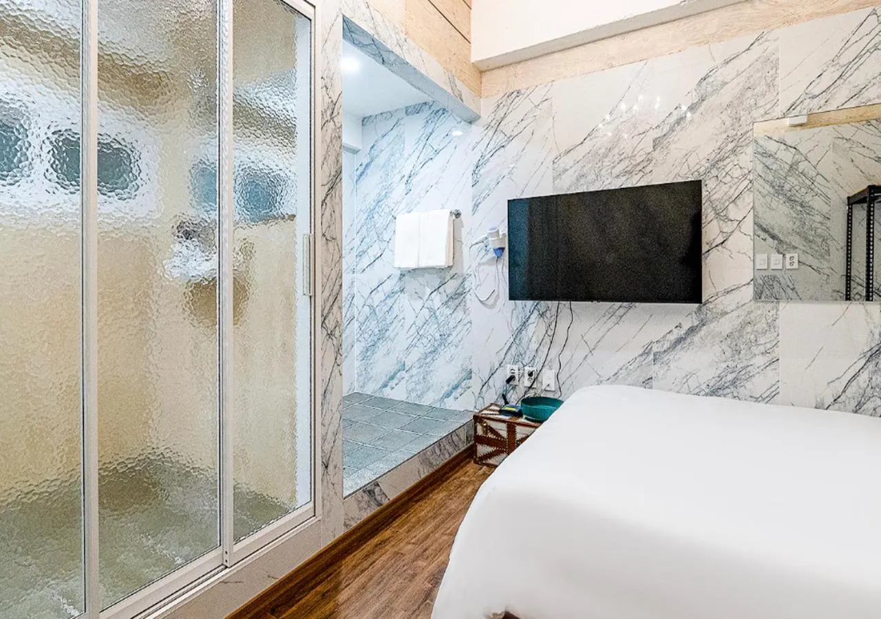 Bed in Woomigwan Hotel