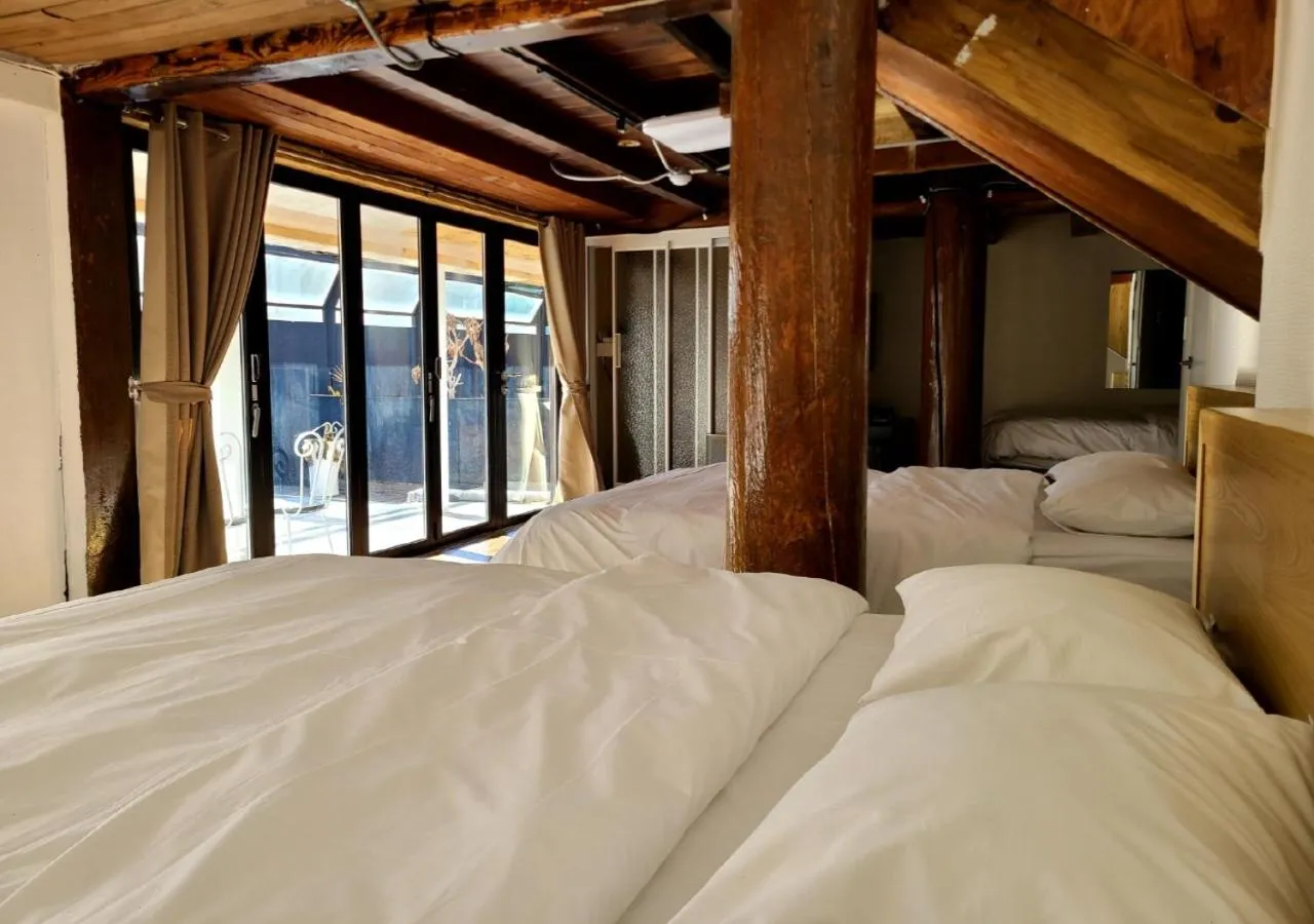 Bedroom, Bed in Woomigwan Hotel