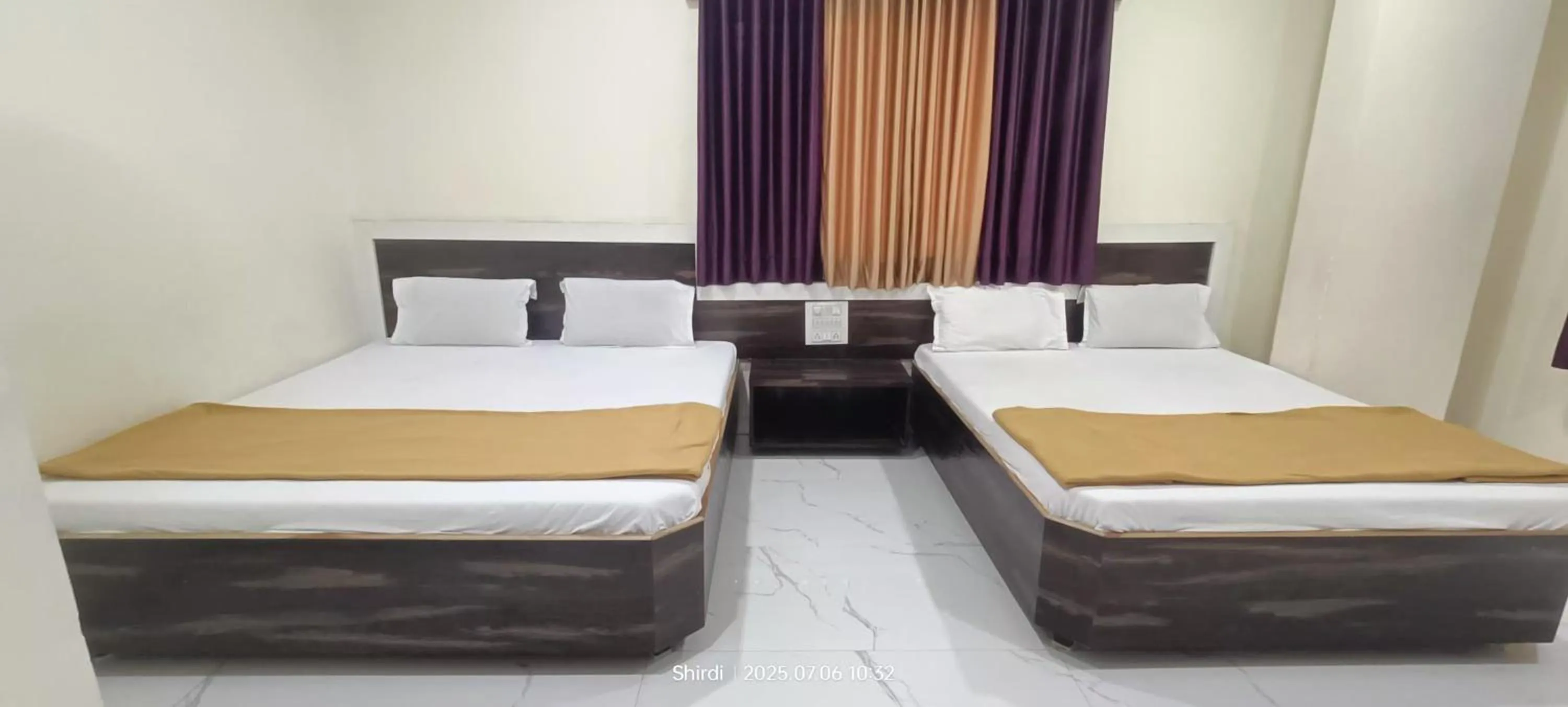 Bed in Hotel Sai viraj palace