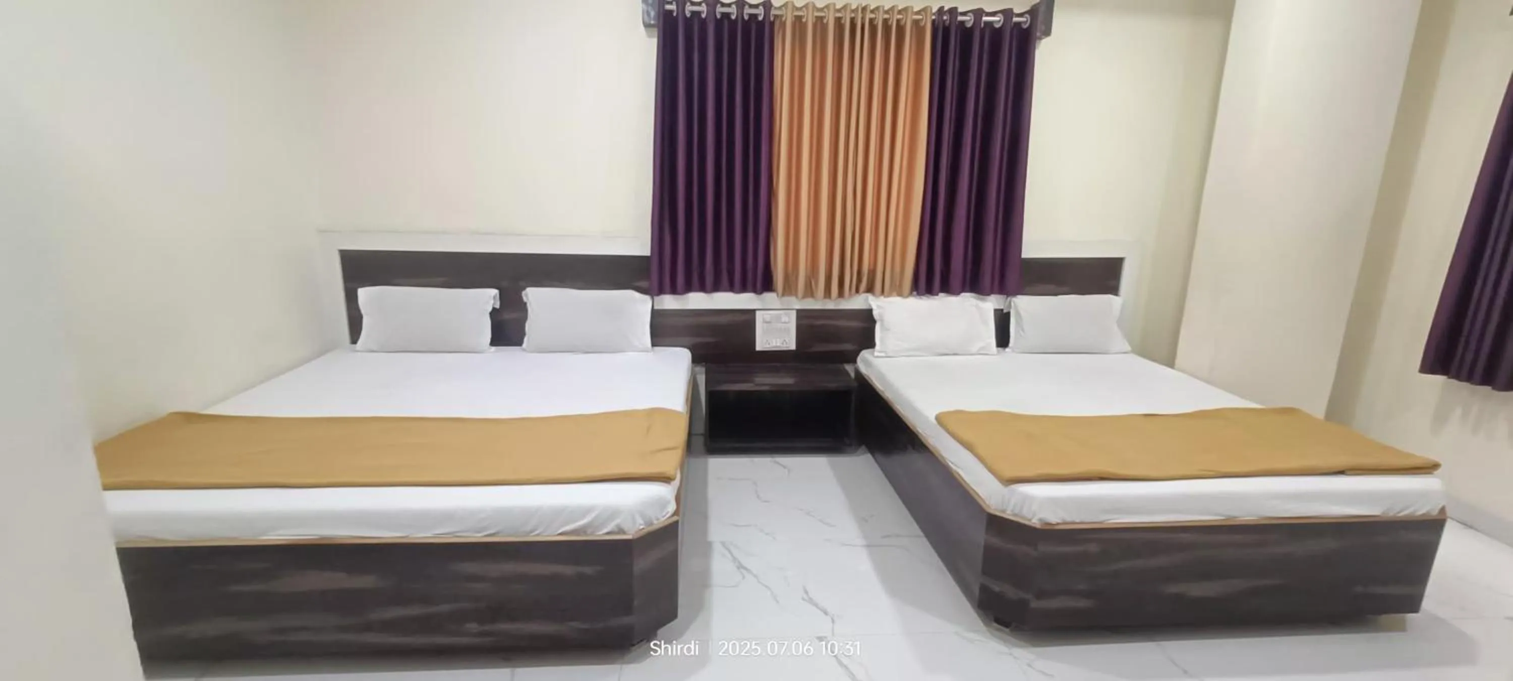 Bed in Hotel Sai viraj palace