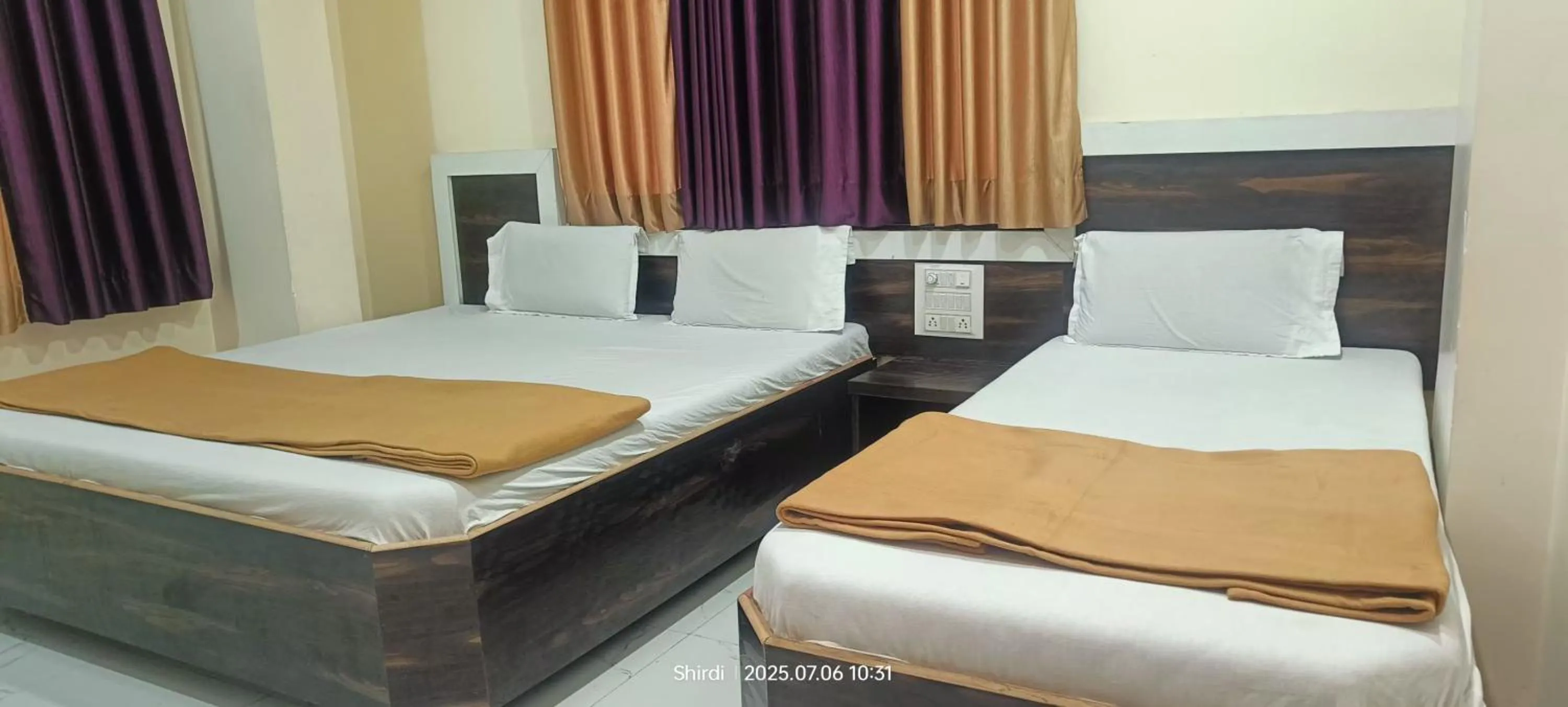 Bed in Hotel Sai viraj palace