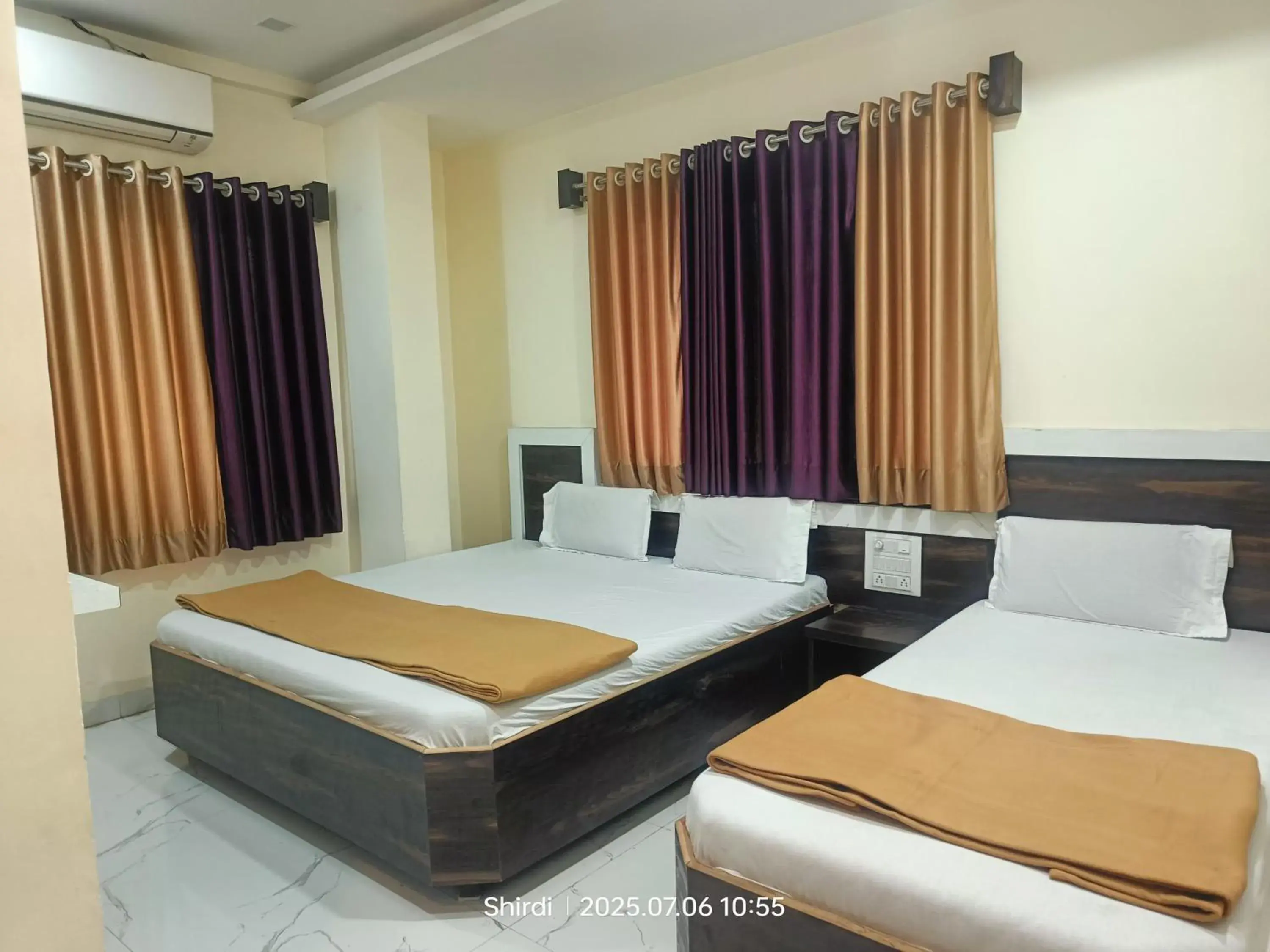 Bed in Hotel Sai viraj palace Bed in Hotel Sai viraj palace