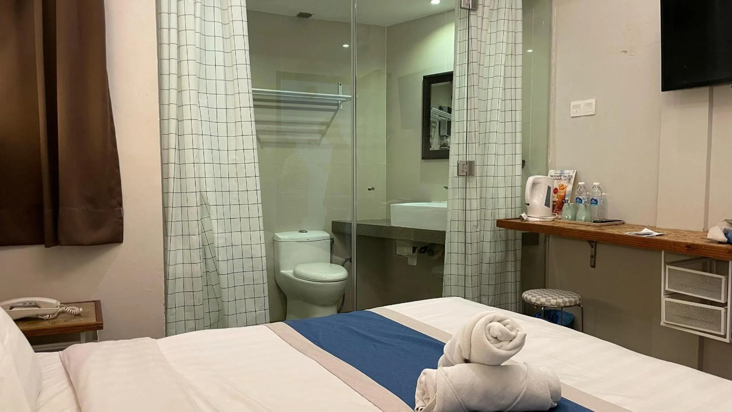 Bed in The Riverbank Hotel By MRVJ Business