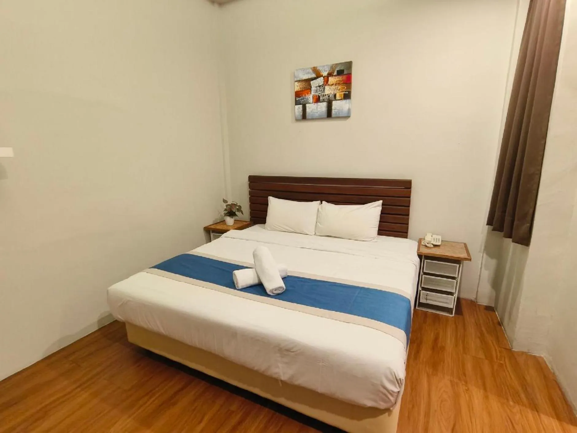 Bedroom, Bed in The Riverbank Hotel By MRVJ Business