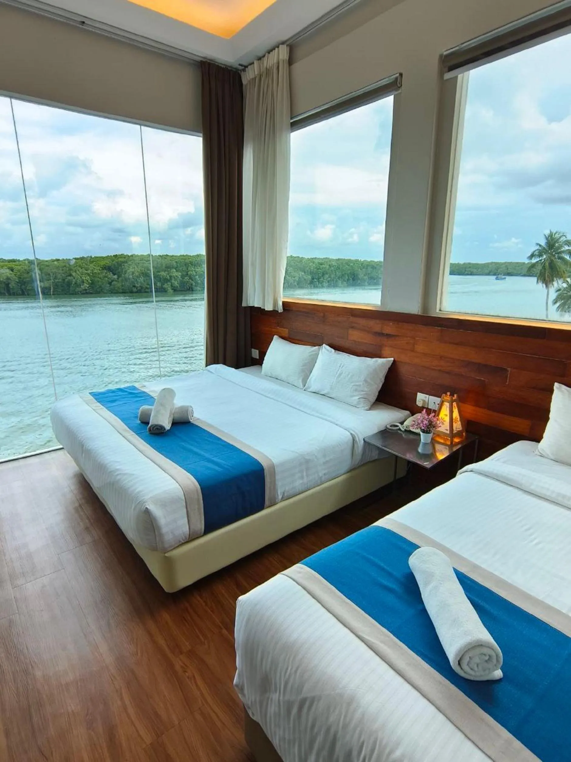 Bed in The Riverbank Hotel By MRVJ Business