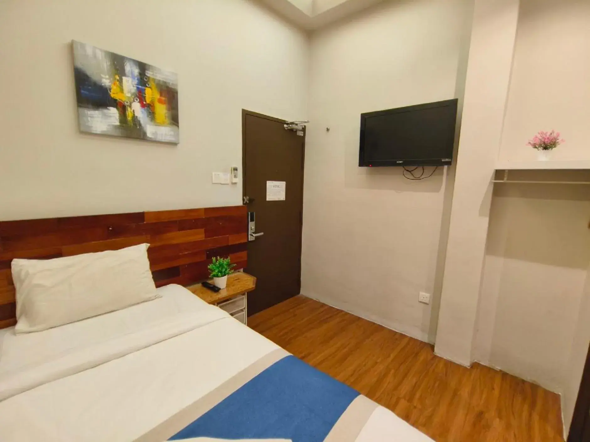 Bedroom in The Riverbank Hotel By MRVJ Business Bedroom in The Riverbank Hotel By MRVJ Business