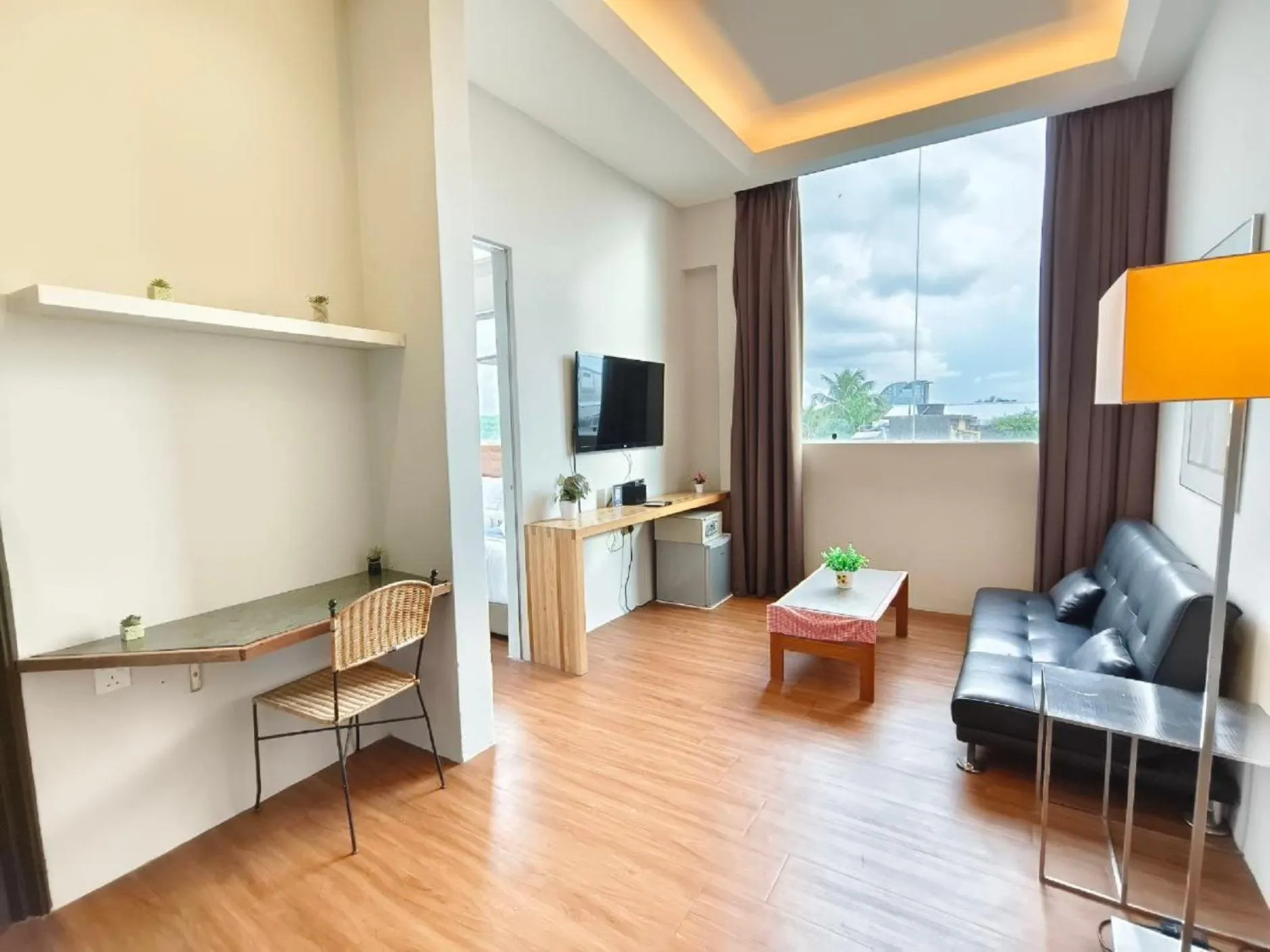 Bedroom in The Riverbank Hotel By MRVJ Business