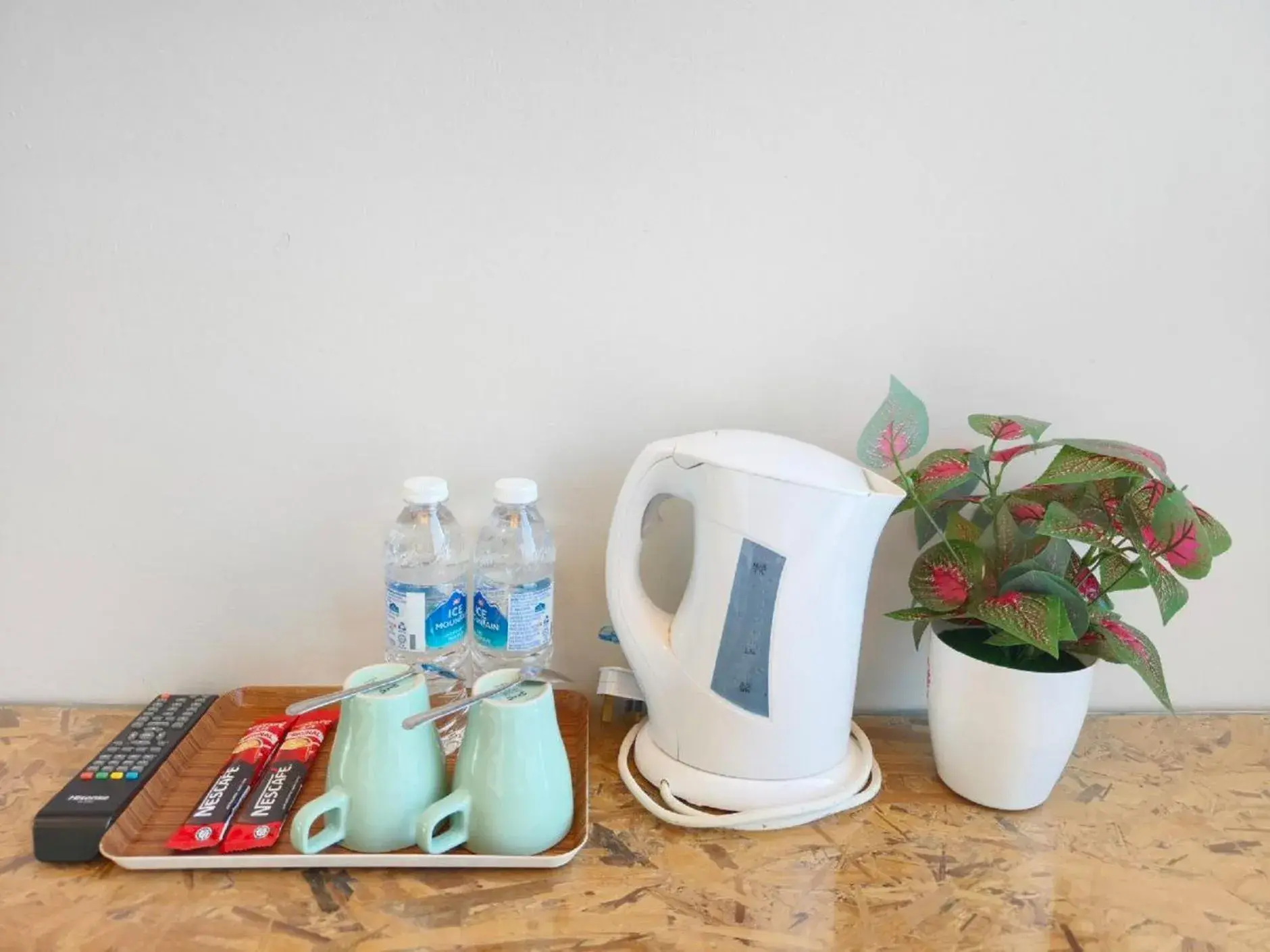 Coffee/tea facilities in The Riverbank Hotel By MRVJ Business Coffee/tea facilities in The Riverbank Hotel By MRVJ Business