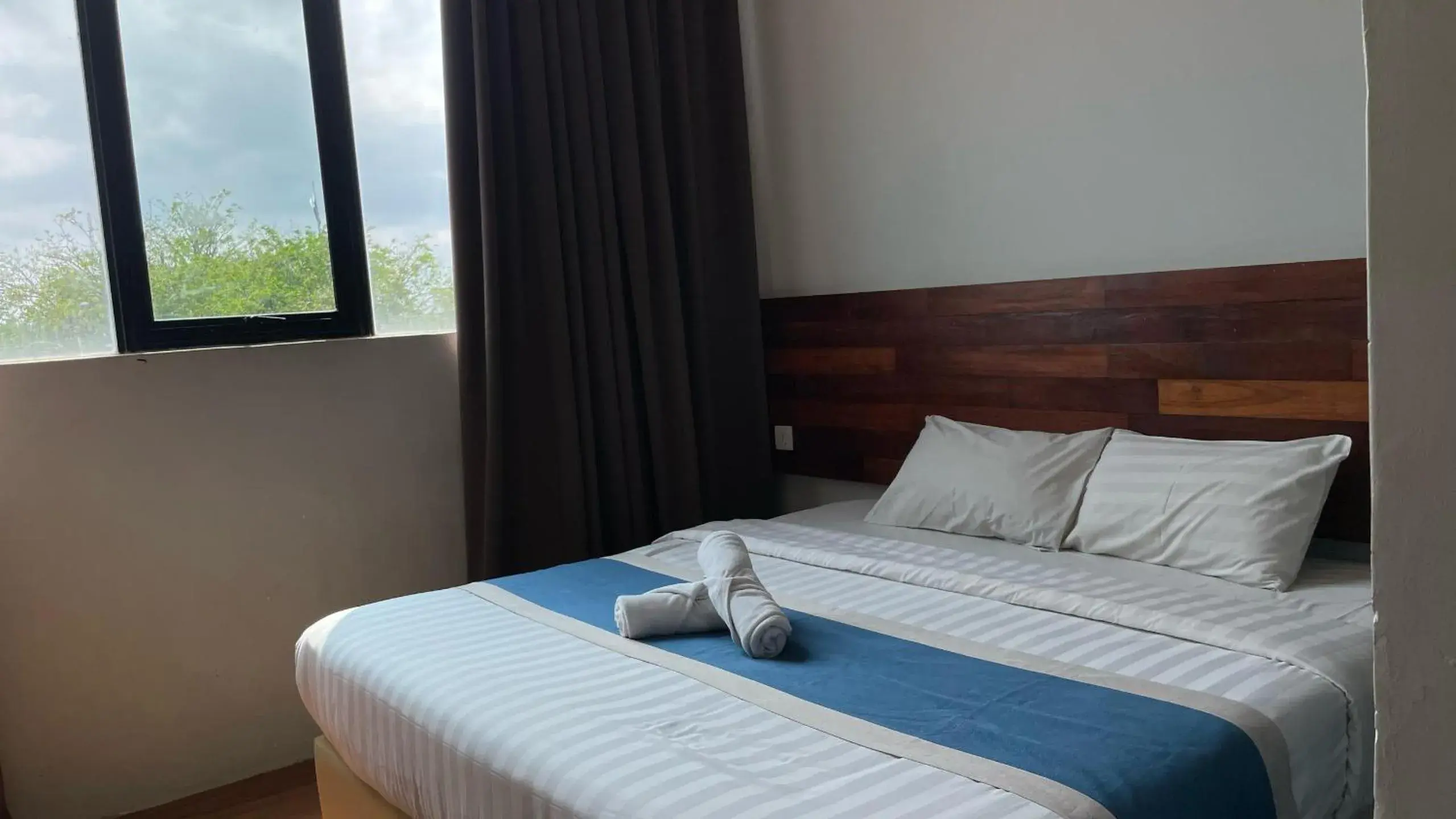 Deluxe Family Suite in The Riverbank Hotel By MRVJ Business Deluxe Family Suite in The Riverbank Hotel By MRVJ Business