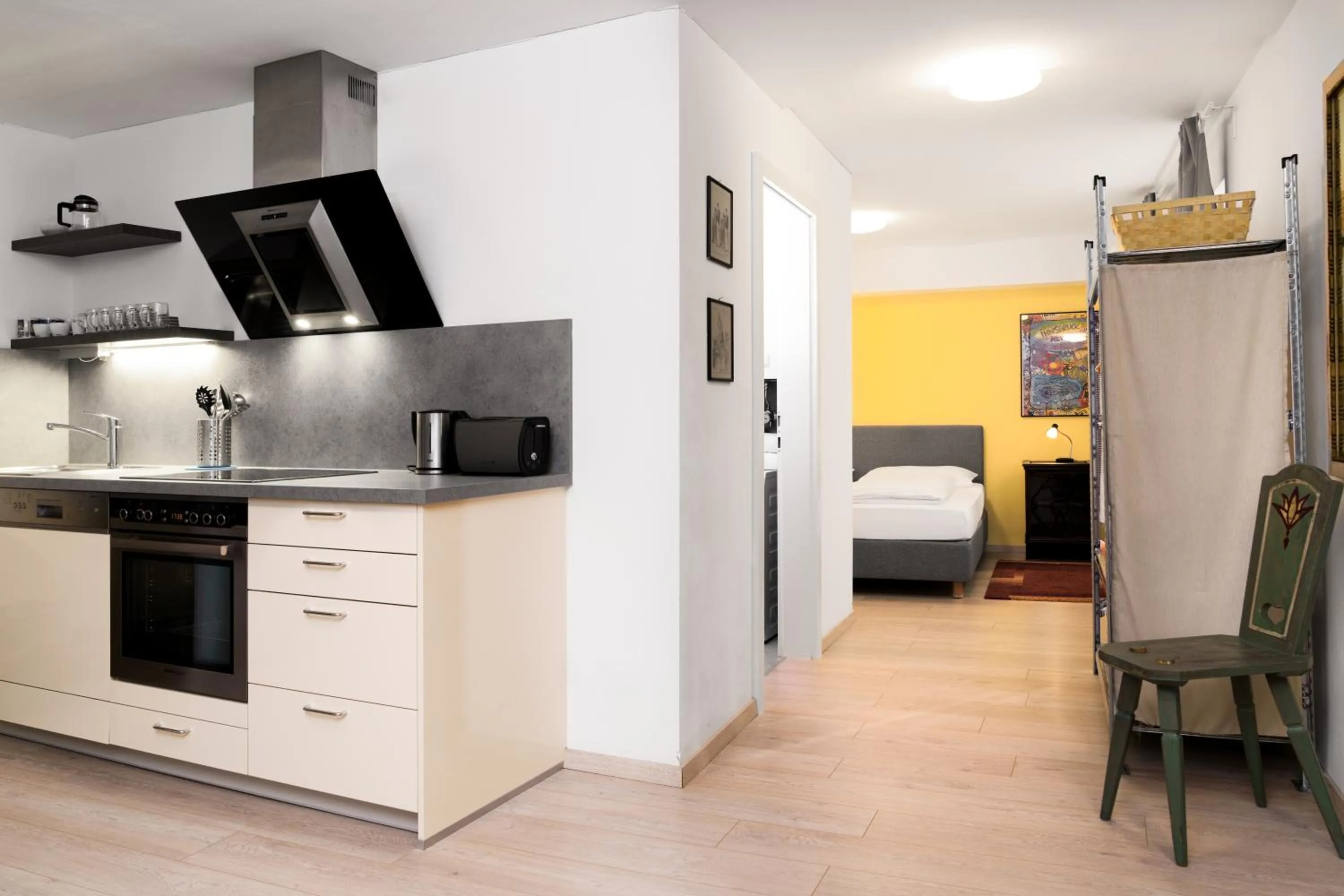 Kitchen or kitchenette, Bed in Apartments Golden Roof by Penz