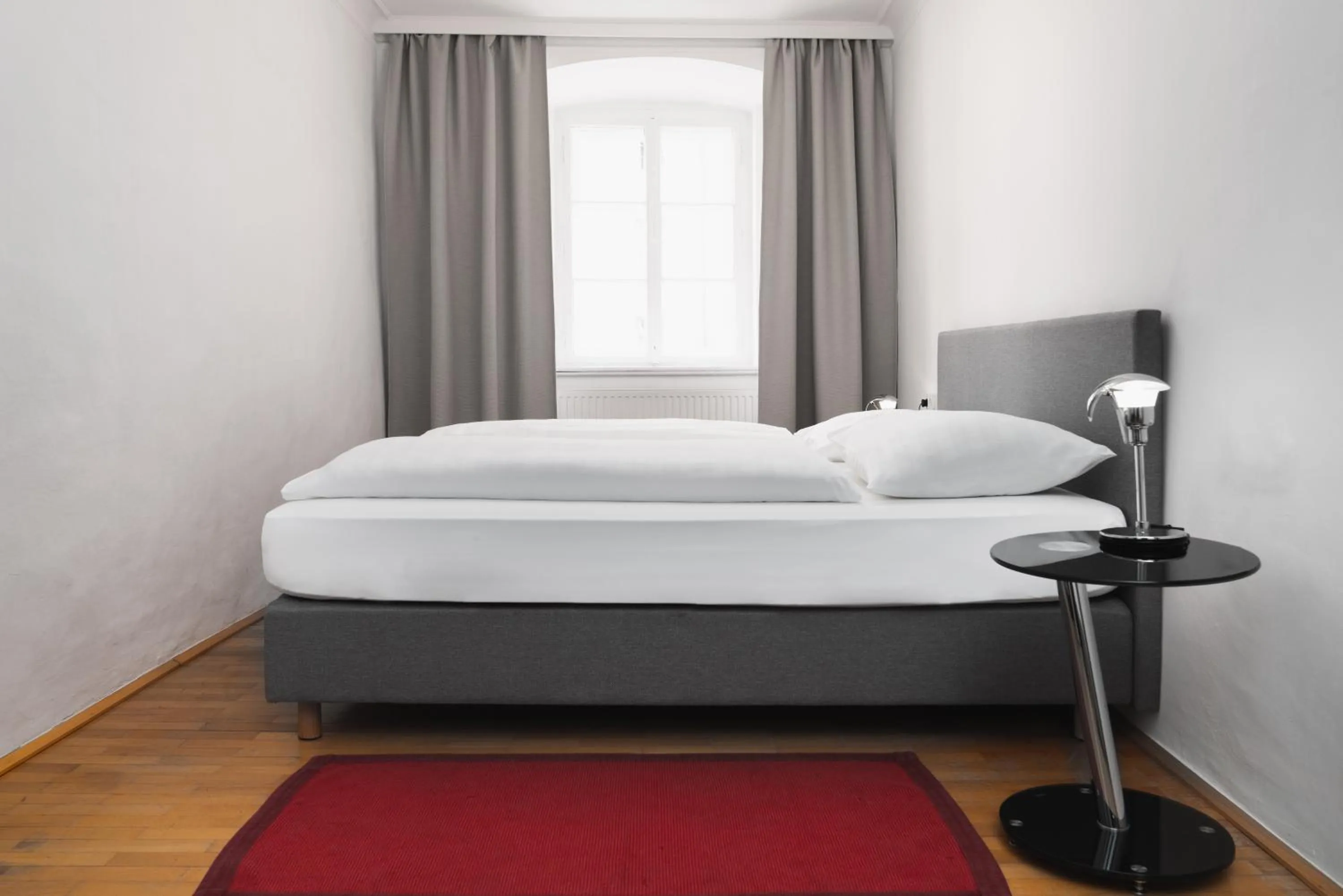 Bed in Apartments Golden Roof by Penz