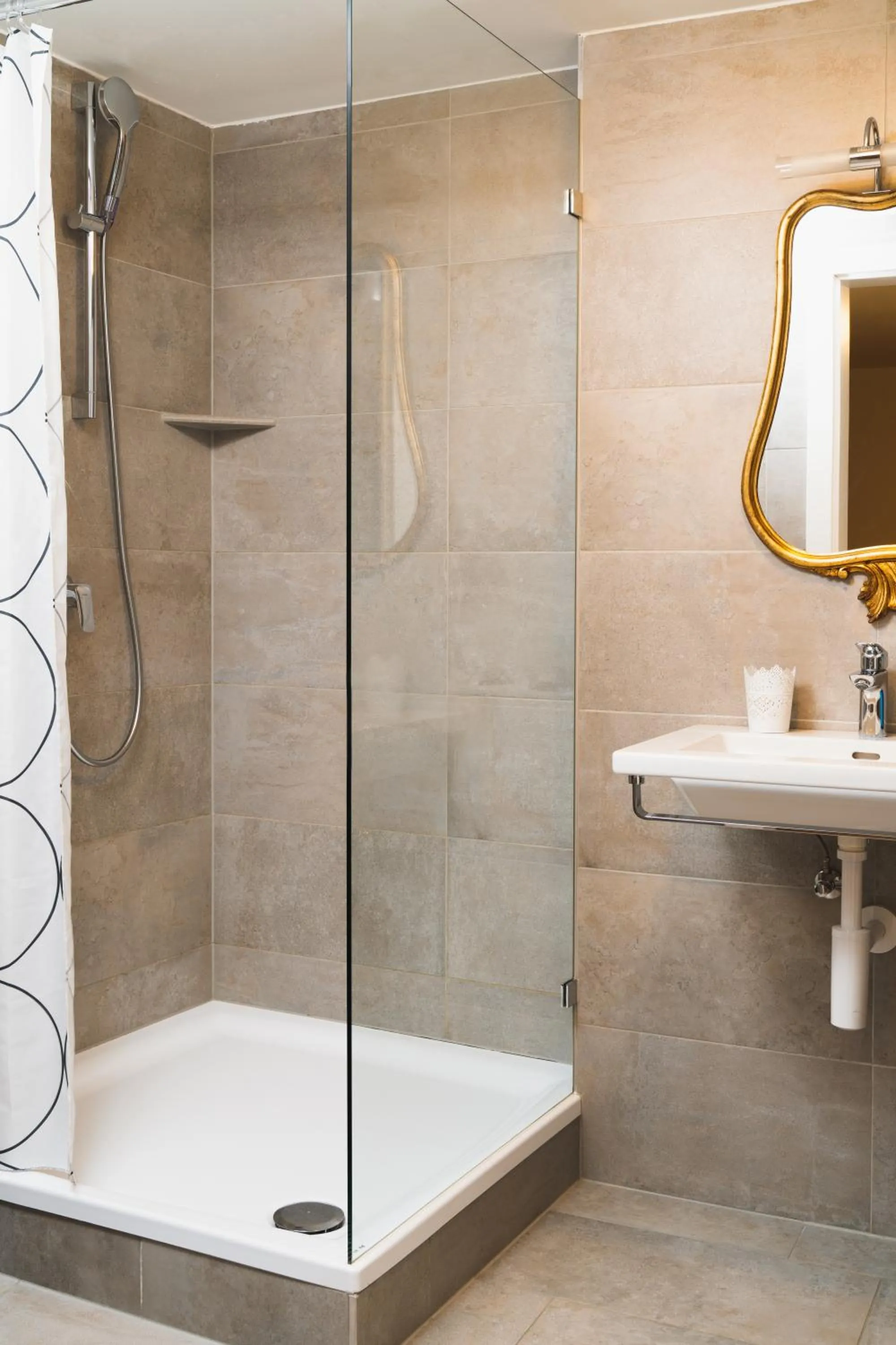 Shower in Apartments Golden Roof by Penz
