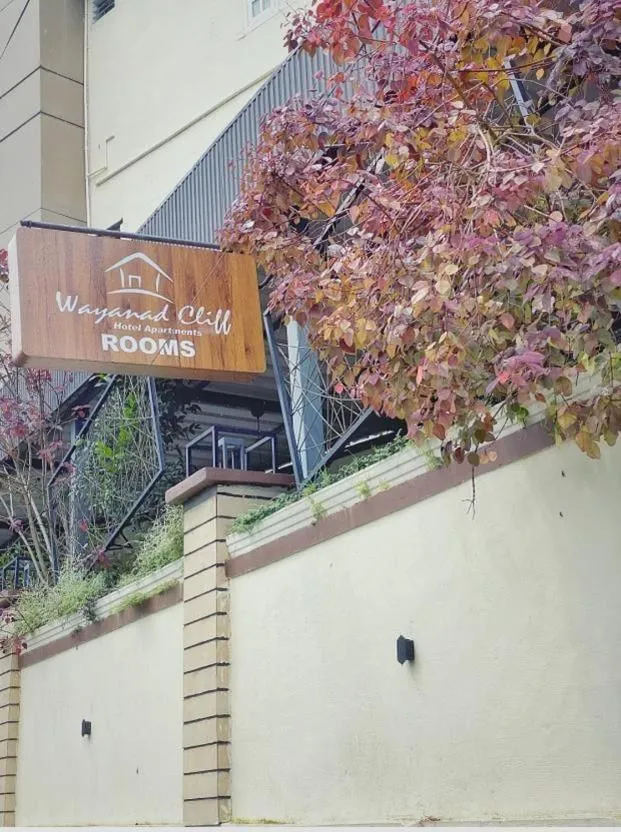 Property logo or sign in Wayanad Cliff Hotel Apartments