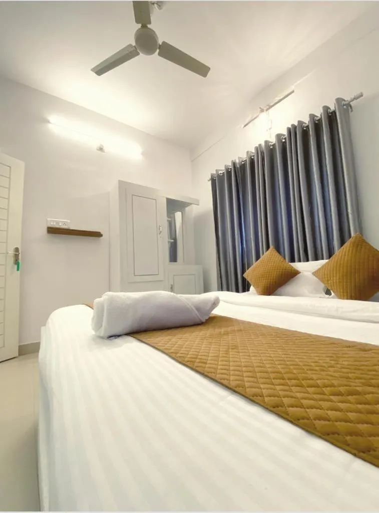 Bed in Wayanad Cliff Hotel Apartments