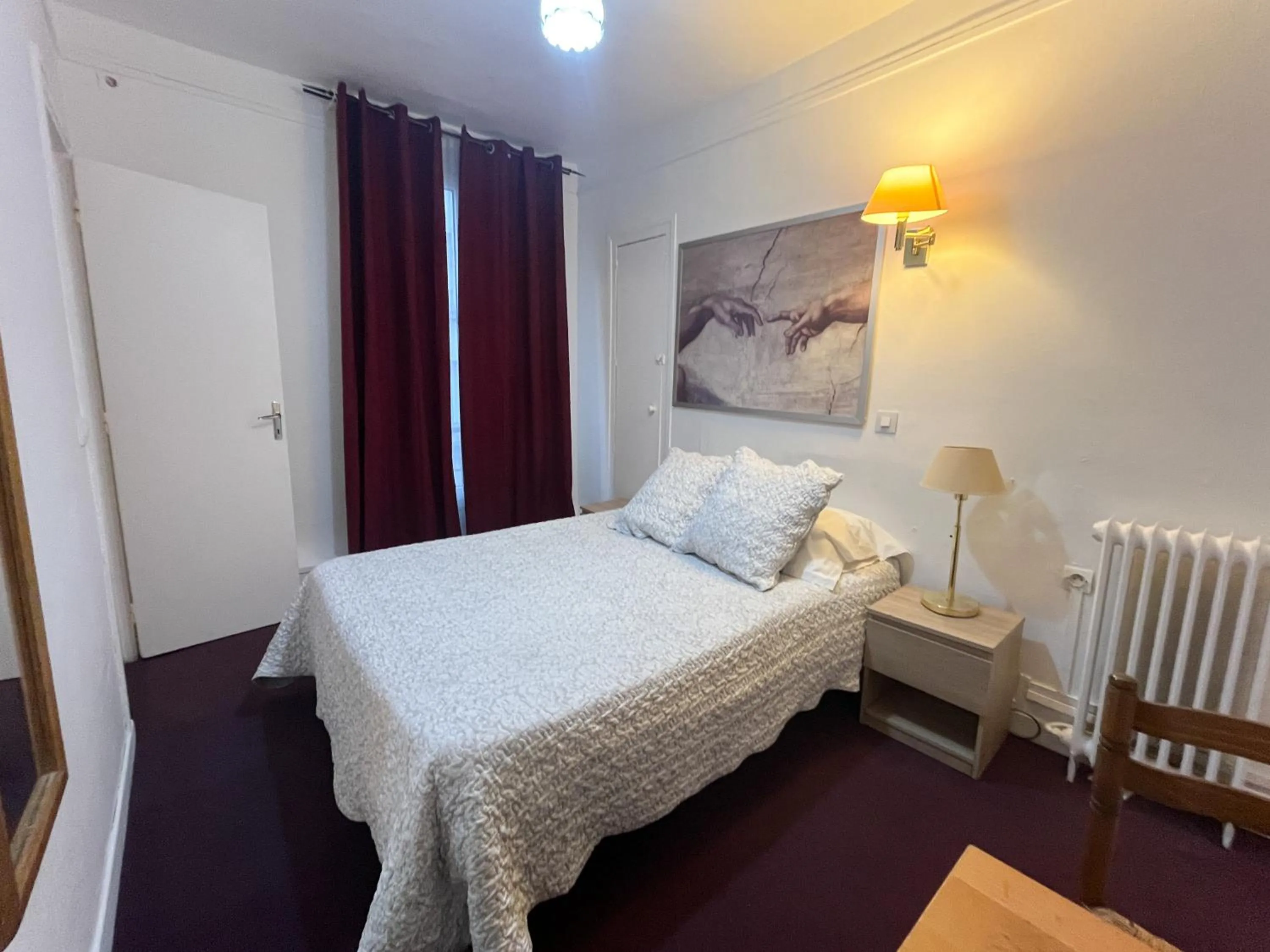 Bedroom in Ideal Hotel