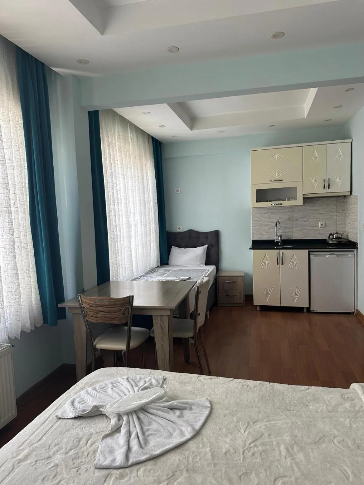 Bed in Birinci Apart Hotel